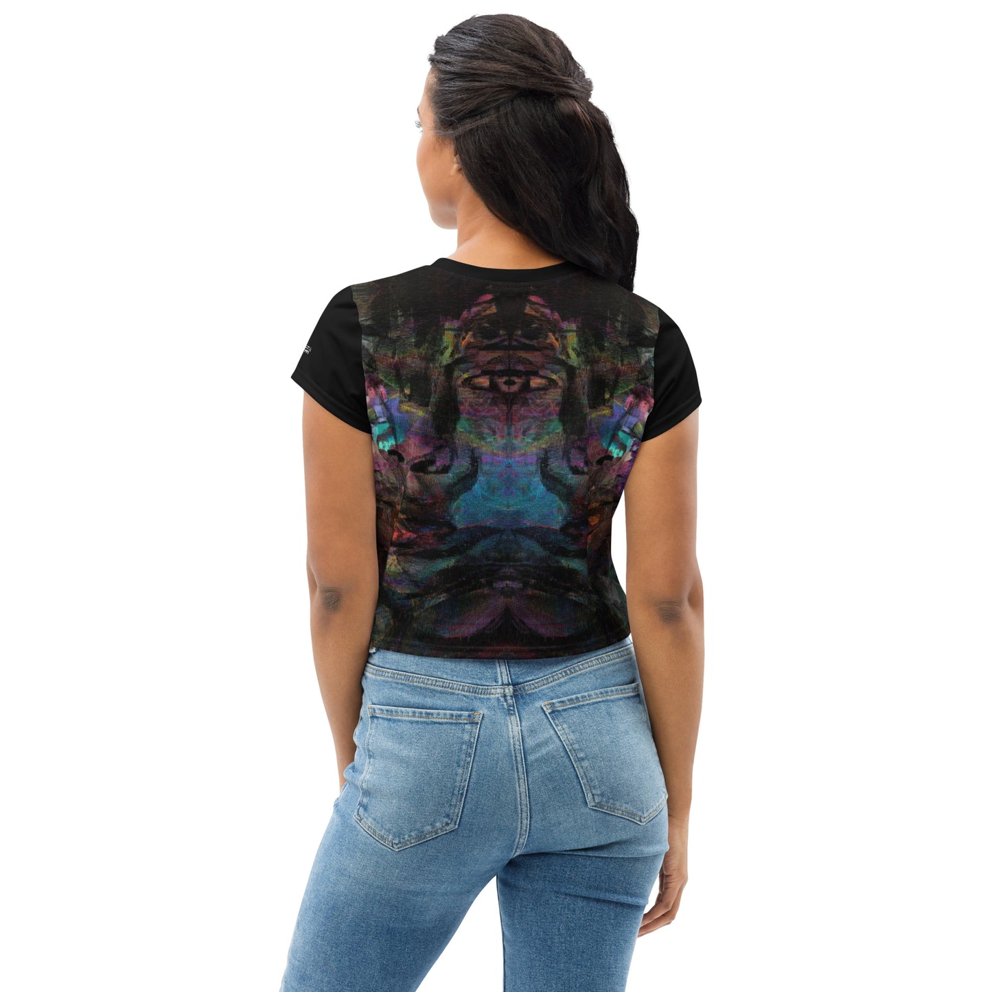 Women's abstract print crop tee with vibrant purple, blue, and orange brushstroke designs, styled with high-waisted jeans – sustainable made-to-order fashion by Hipyfi. back-4