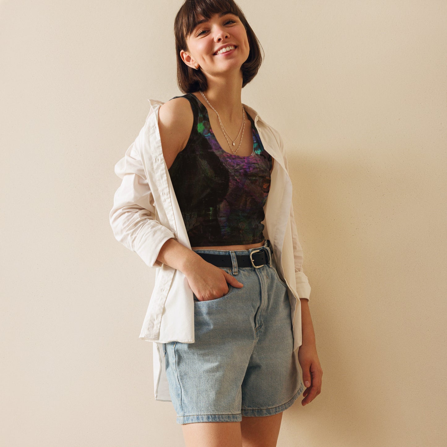 Chromatic Dreams Crop Top with vibrant patterns and abstract art. Features body-hugging fit, four-way stretch fabric, and eco-friendly design by Hipyfi. front