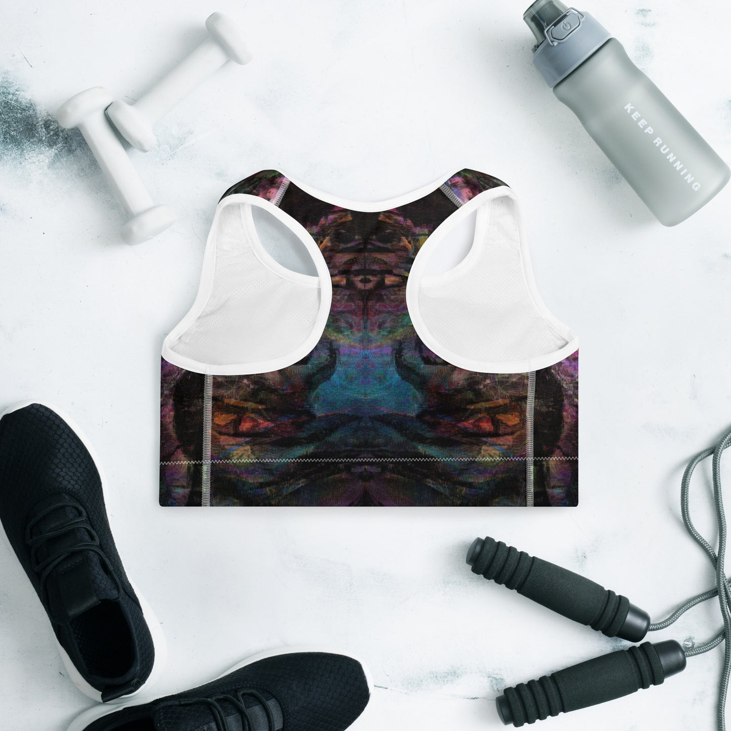 Vibrant abstract-pattern sports bra for women with bold purple, and racerback design. Hipyfi’s Chromatic Dreams high-impact bra, crafted sustainably for A–C cups. back