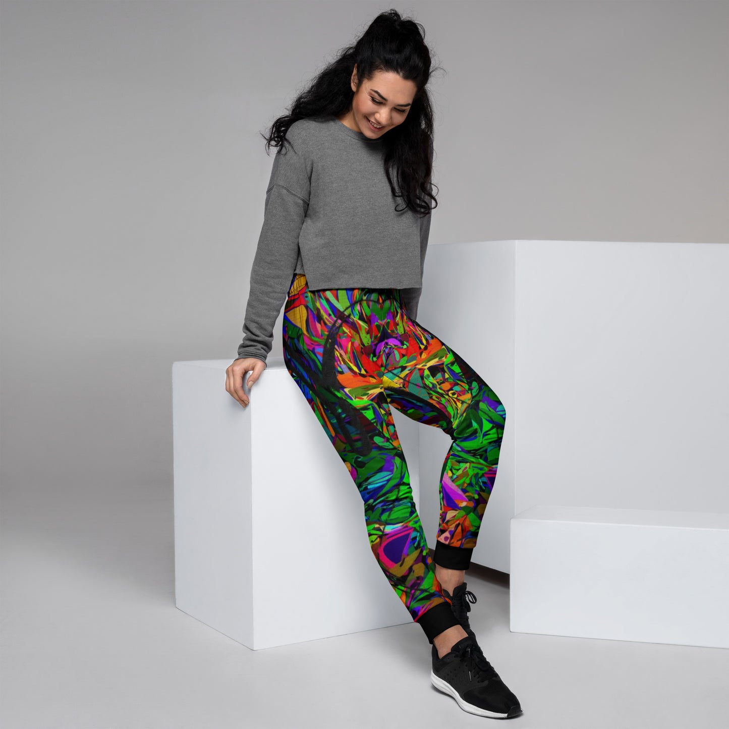 Eco-friendly women’s joggers with vibrant abstract neon print – Neon Mythos design by Hipyfi Clothes & Design Right