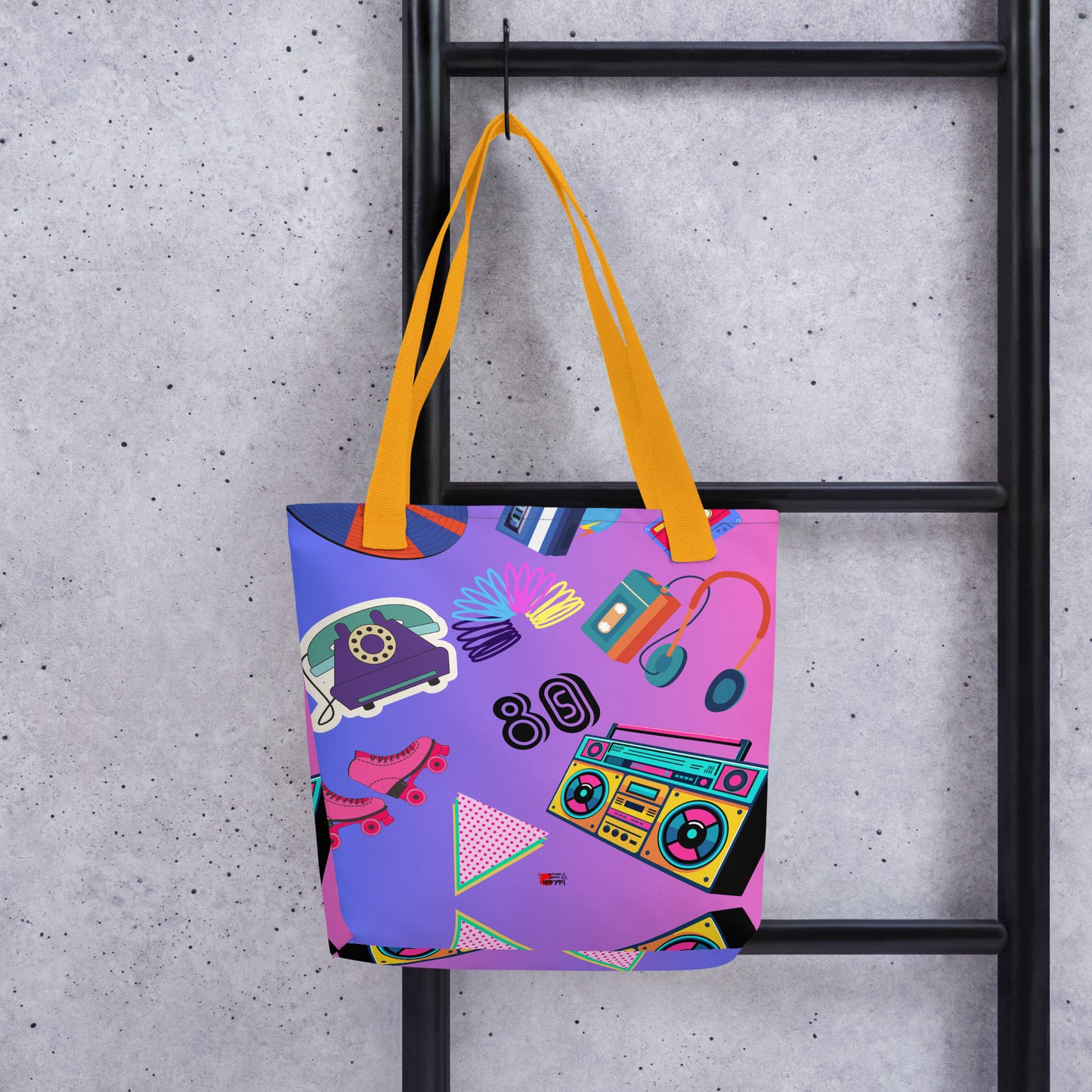 Hipyfi 80s Retro Neon Pop Tote Bag featuring vibrant geometric design and cassette tape icons, eco-friendly, with durable cotton denim handles. Yellow-front-2