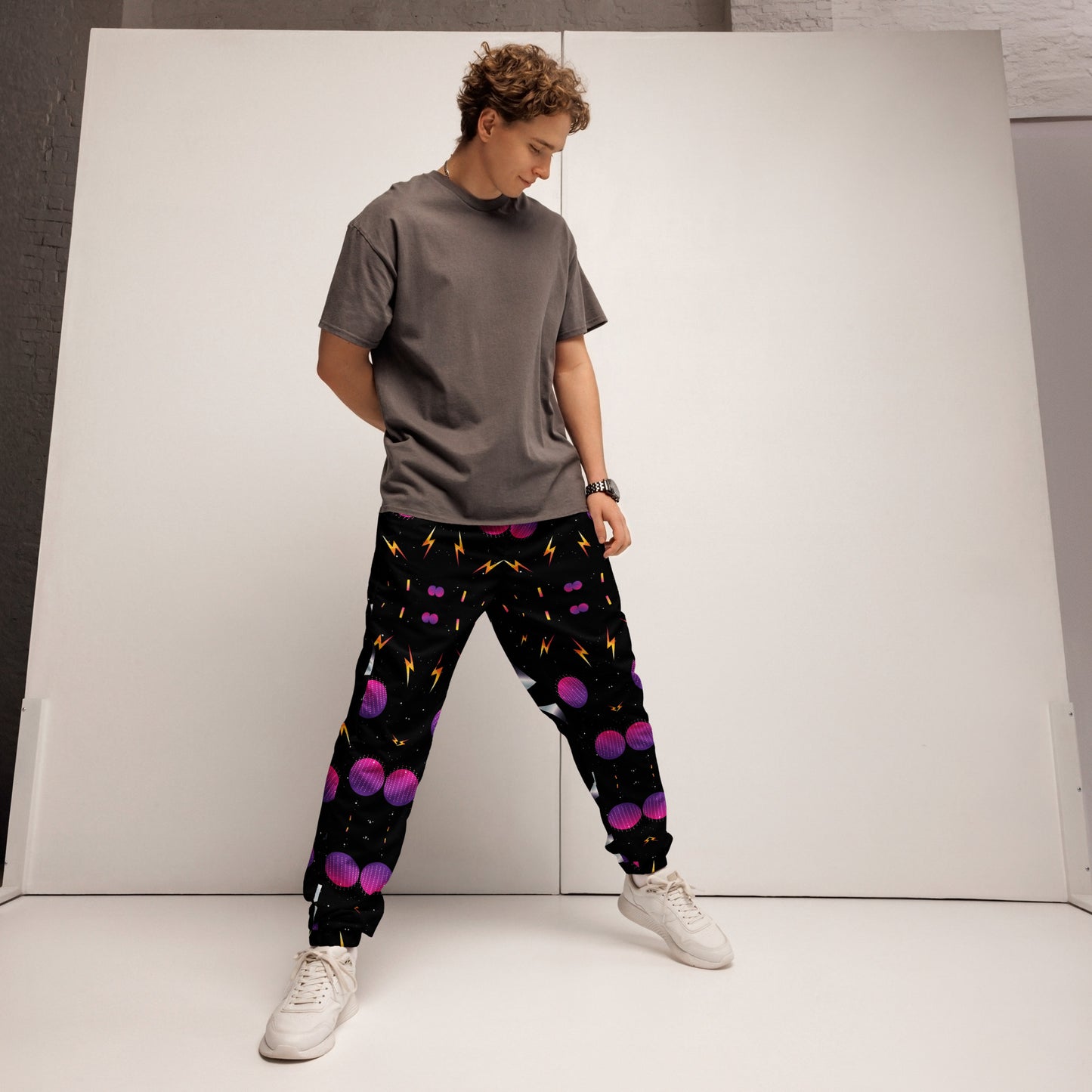 Hipyfi Synthwave Unisex Track Pants with retro geometric neon 80s design – streetwear joggers for men and women. front-3