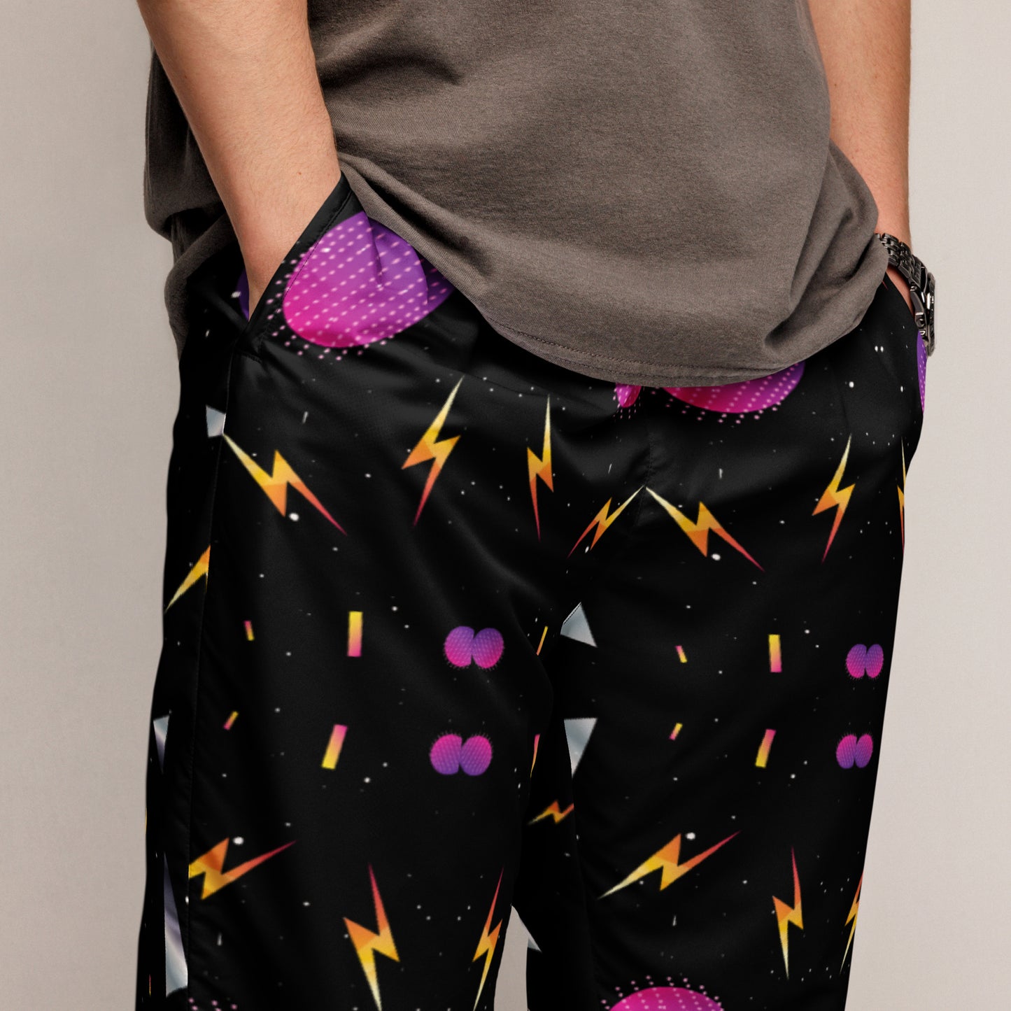 Hipyfi Synthwave Unisex Track Pants with retro geometric neon 80s design – streetwear joggers for men and women. zoomed-in