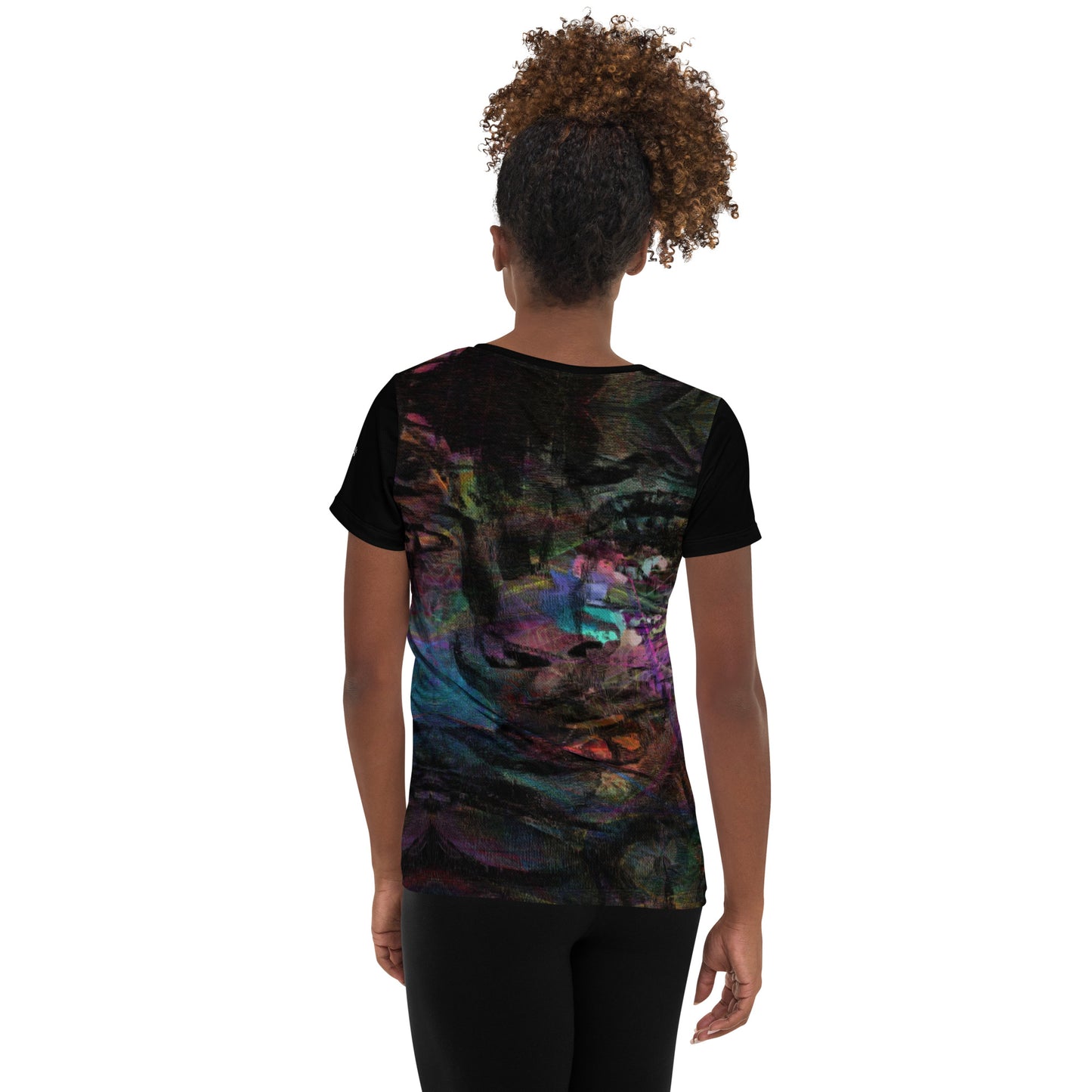 A woman in a vibrant Hipyfi Chromatic Dreams Athletic Tee. The artistic pattern blends, while the lightweight and performance-ready fit. back-2