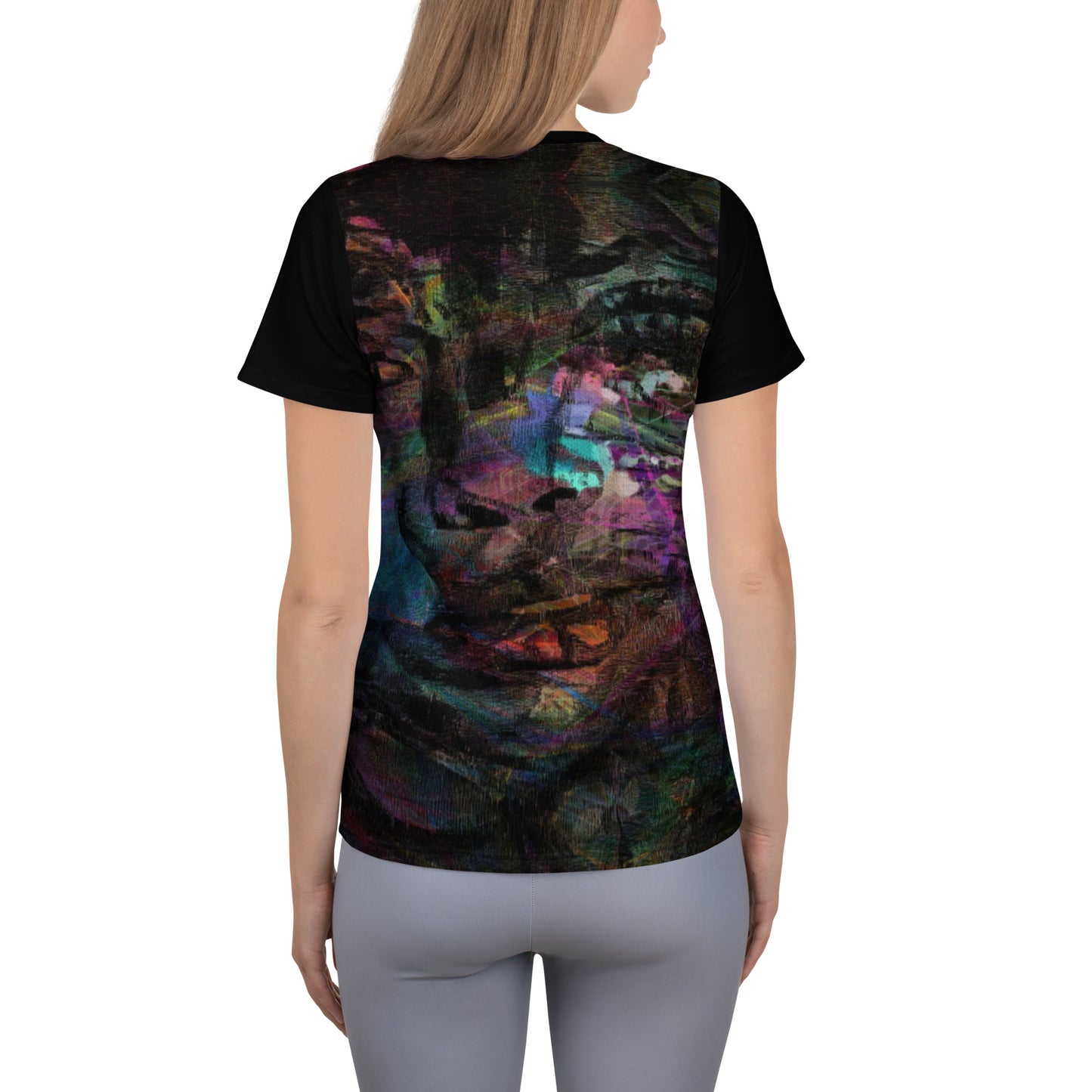A woman in a vibrant Hipyfi Chromatic Dreams Athletic Tee. The artistic pattern blends, while the lightweight and performance-ready fit. back-6