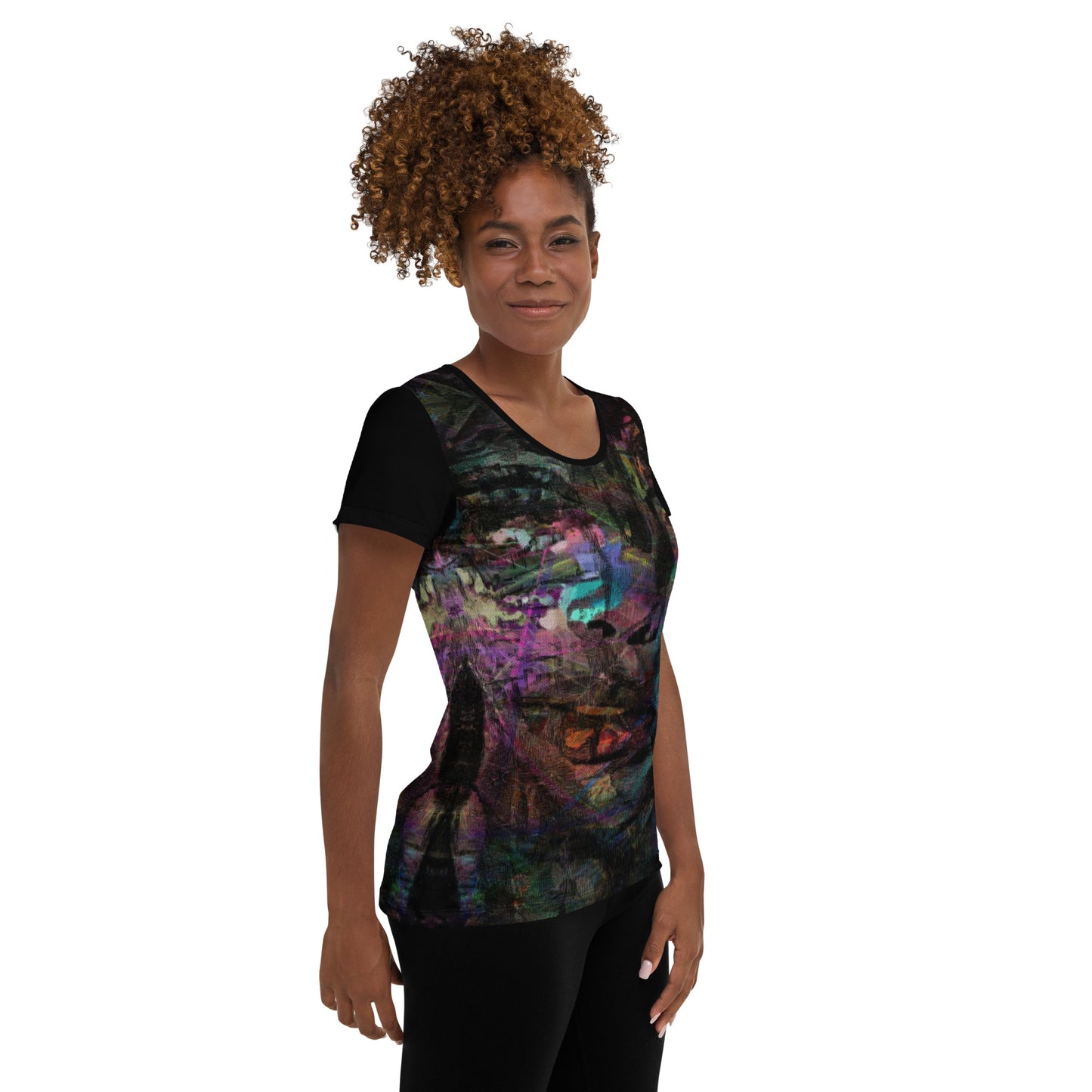 A woman in a vibrant Hipyfi Chromatic Dreams Athletic Tee. The artistic pattern blends, while the lightweight and performance-ready fit. right-2