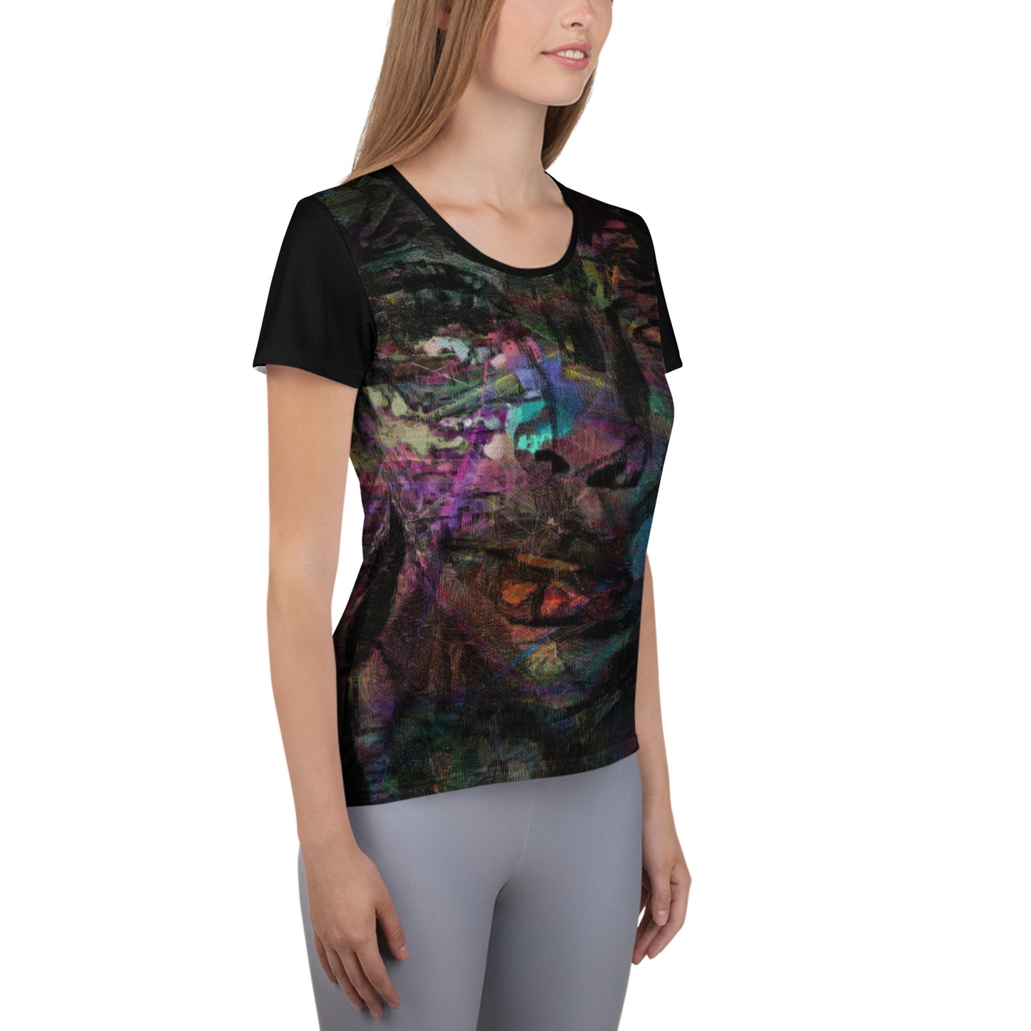 A woman in a vibrant Hipyfi Chromatic Dreams Athletic Tee. The artistic pattern blends, while the lightweight and performance-ready fit. right-6