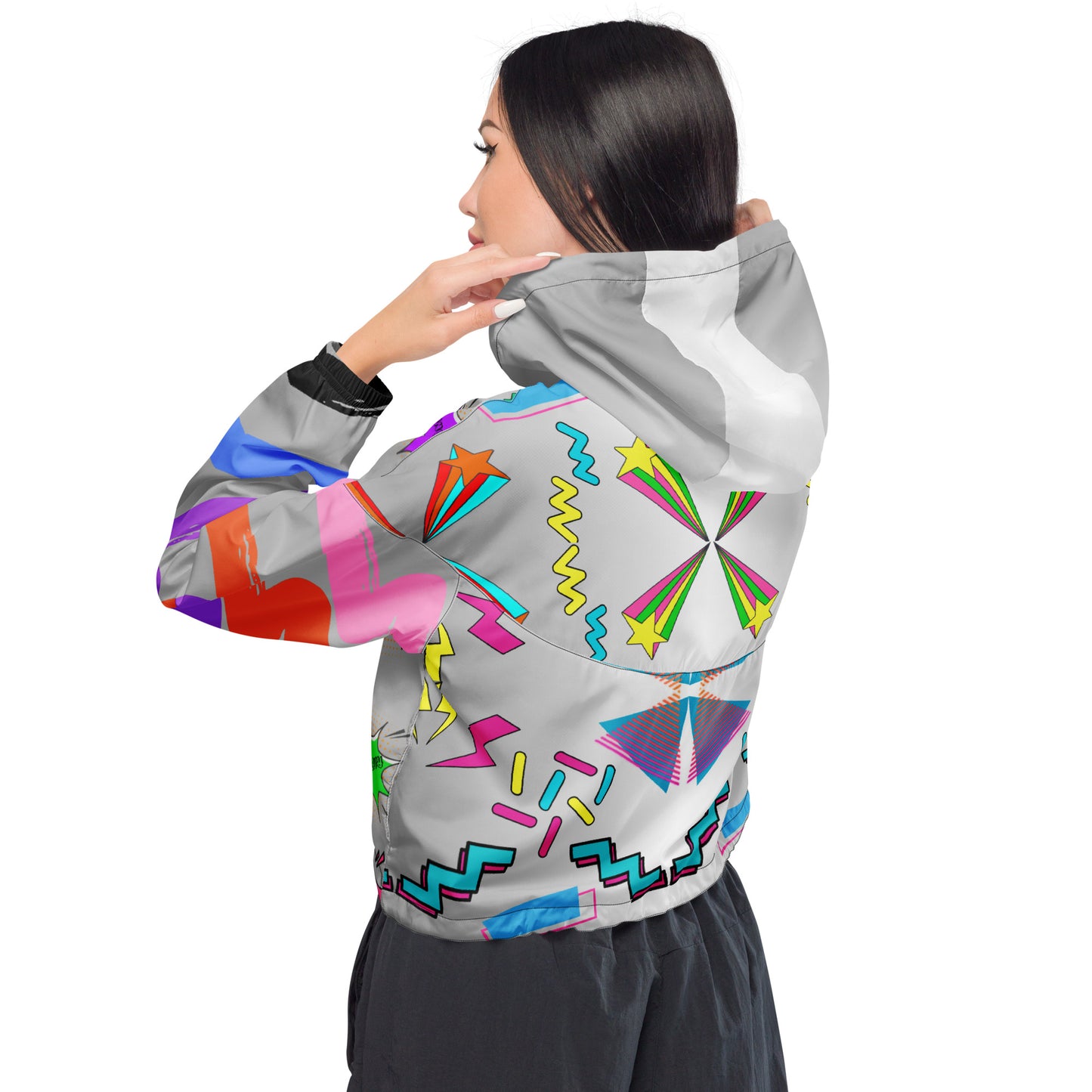 Hipyfi Women’s Retro 80s Graphic Print Cropped Windbreaker with bold neon comic-book slang, retro-futuristic geometric patterns, and contrasting vibrant sleeves. Black back