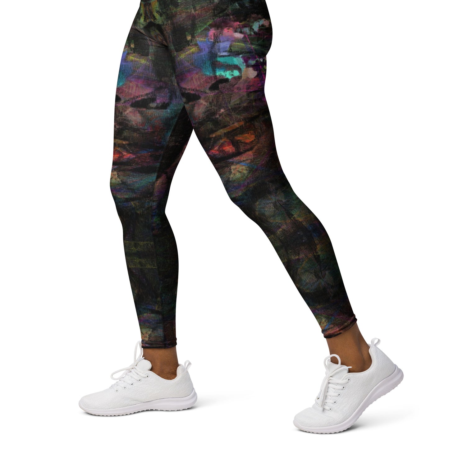 Close-up of women's Chromatic Dreams Yoga Leggings with bold abstract Art Print. Features four-way stretch fabric and a sculpted waistband, ethically crafted by Hipyfi. left