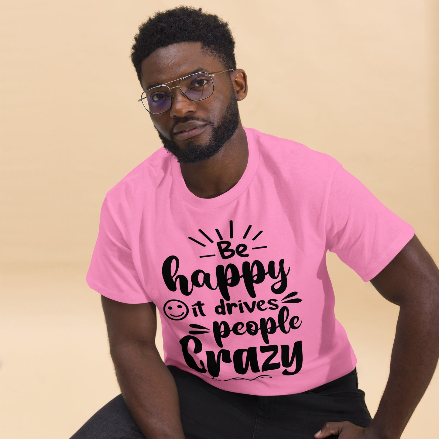 Unisex inspirational t-shirt with “Be Happy, It Drives People Crazy” quote in bold typography – Hipyfi Clothes & Design graphic tee. azalea-front