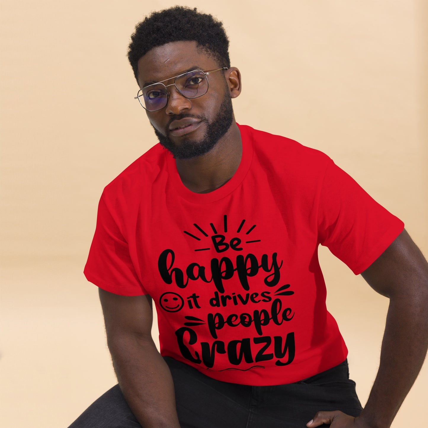Unisex inspirational t-shirt with “Be Happy, It Drives People Crazy” quote in bold typography – Hipyfi Clothes & Design graphic tee. red-front