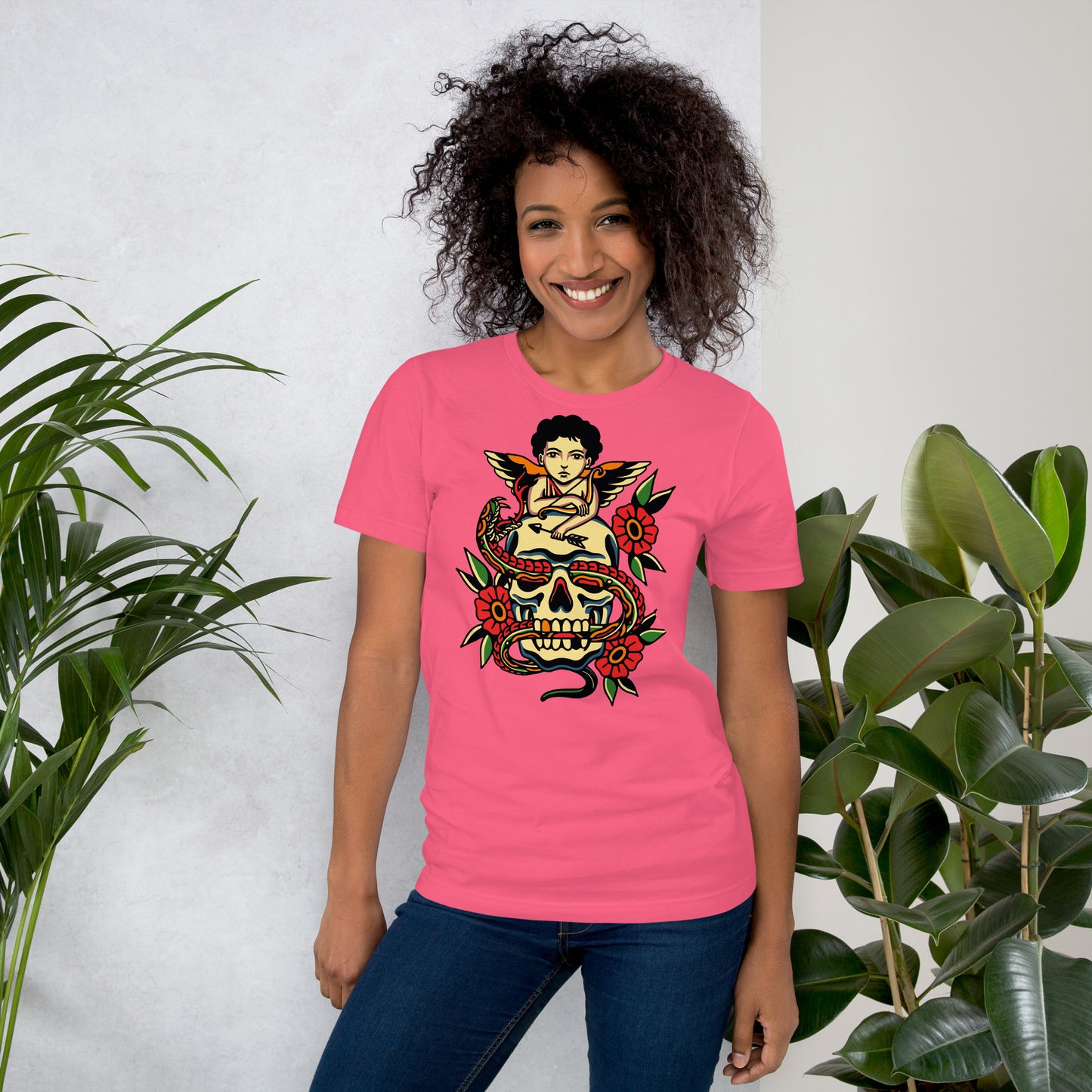 Unisex tattoo art T-shirt featuring cherub, skull, and snake design – Hipyfi vintage graphic tee. charity-pink-front