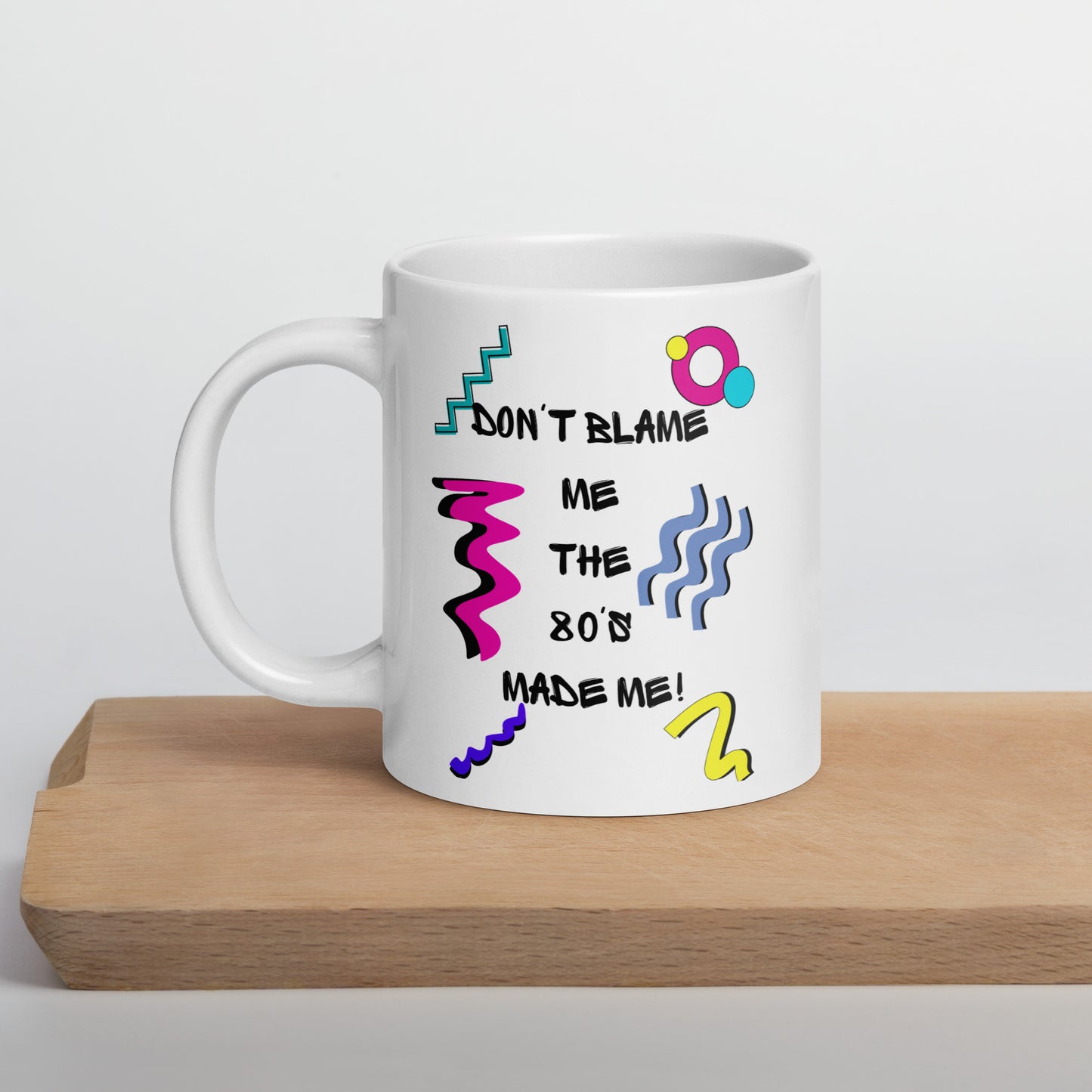 Retro 80s ceramic mug with colorful abstract design and ‘Don’t Blame Me, The 80s Made Me!’ quote by Hipyfi Clothes & Design 20-oz-cutting-board