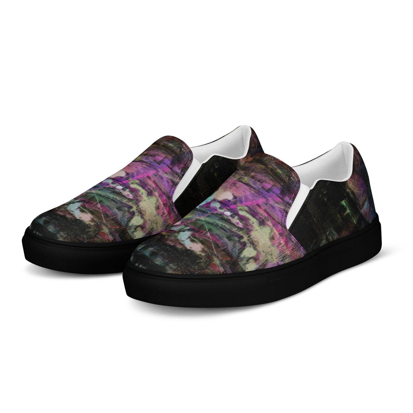 Close-up of Hipyfi Women’s Chromatic Dreams slip-on sneakers, showcasing a modern abstract face design with multicolor, elastic side accents, and a cushioned sole for comfort. black-left-front