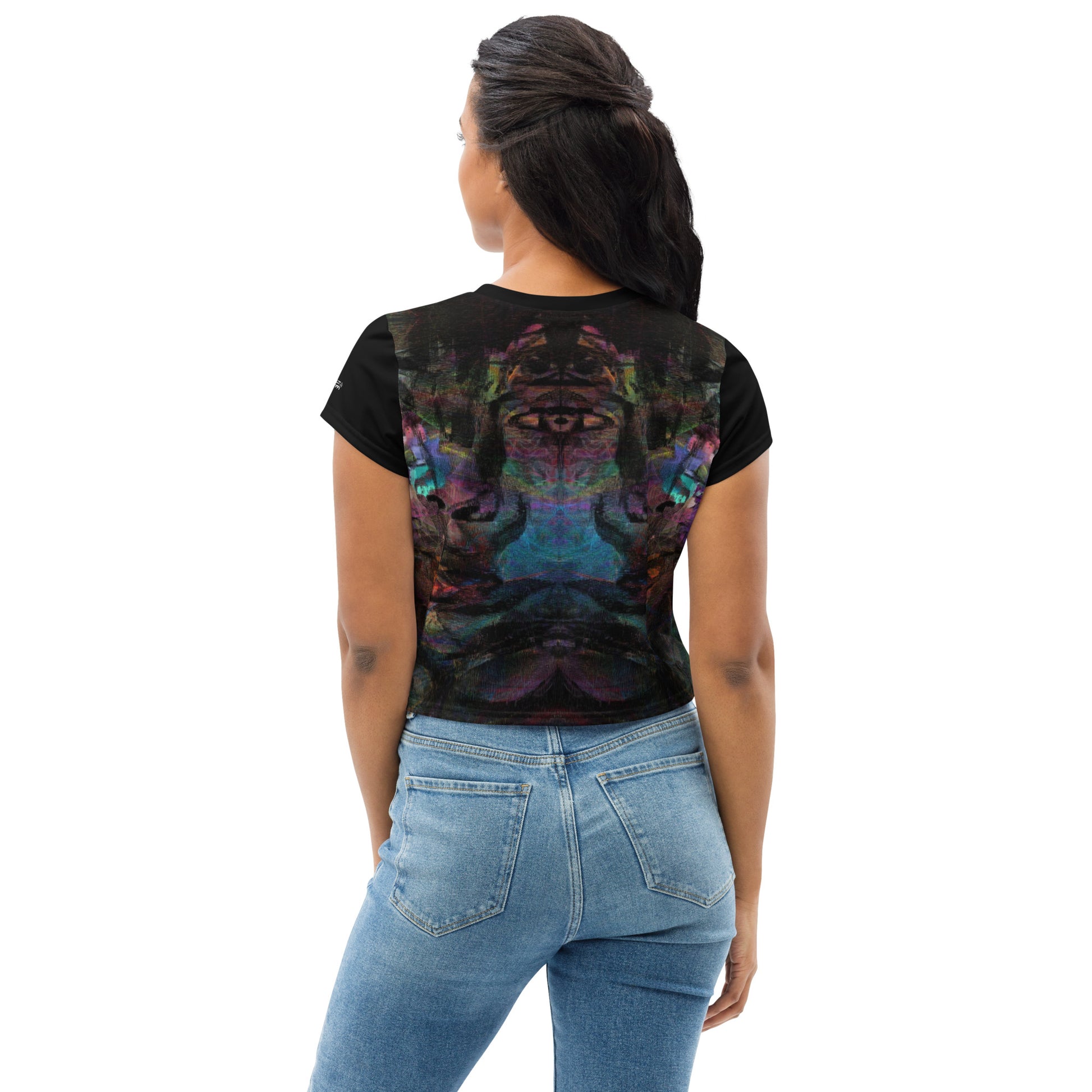 Women's abstract print crop tee with vibrant purple, blue, and orange brushstroke designs, styled with high-waisted jeans – sustainable made-to-order fashion by Hipyfi. back-4