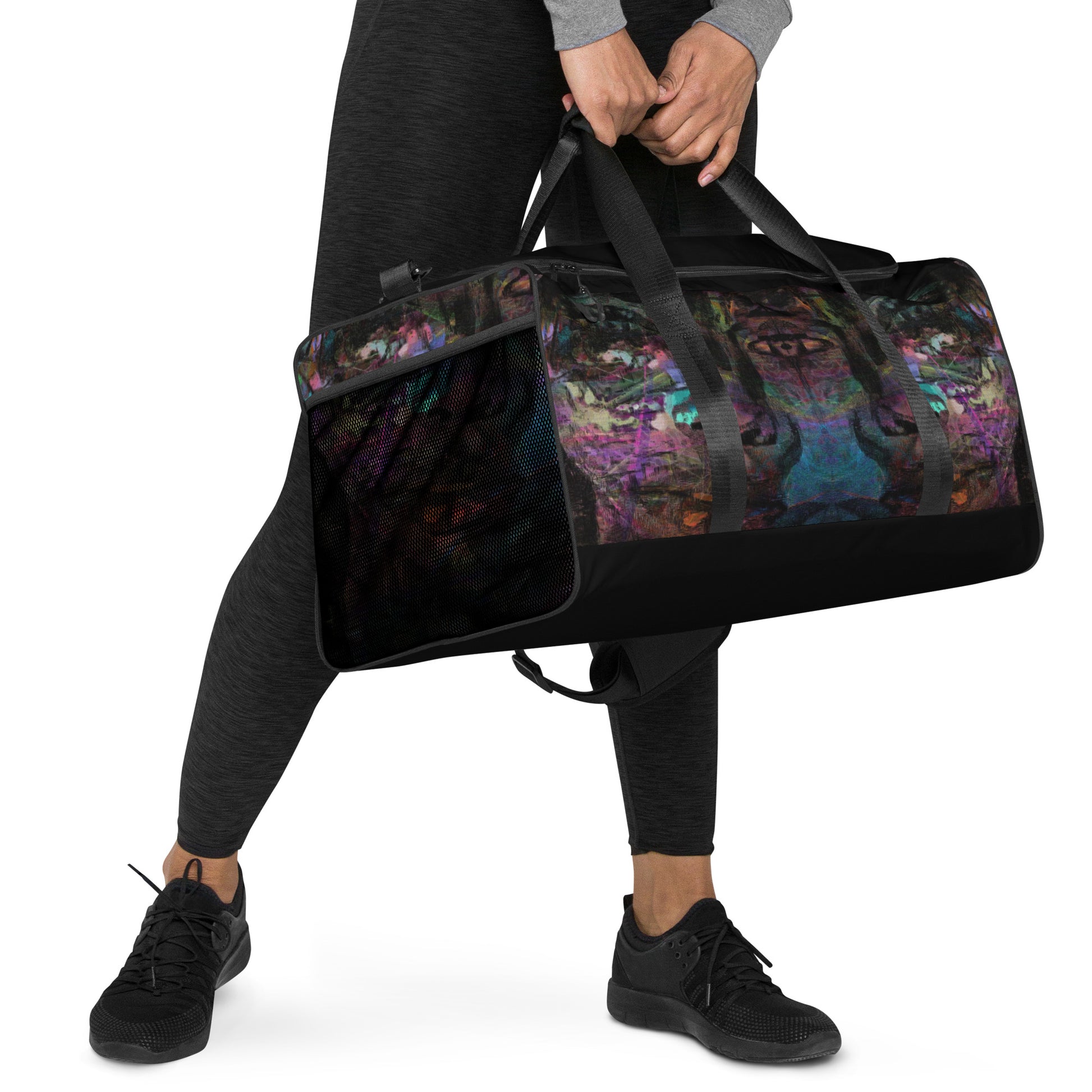 Hipyfi Chromatic Dreams Duffle Bag with bold multicolor abstract all-over print, ideal for gym and travel. Girl right-front