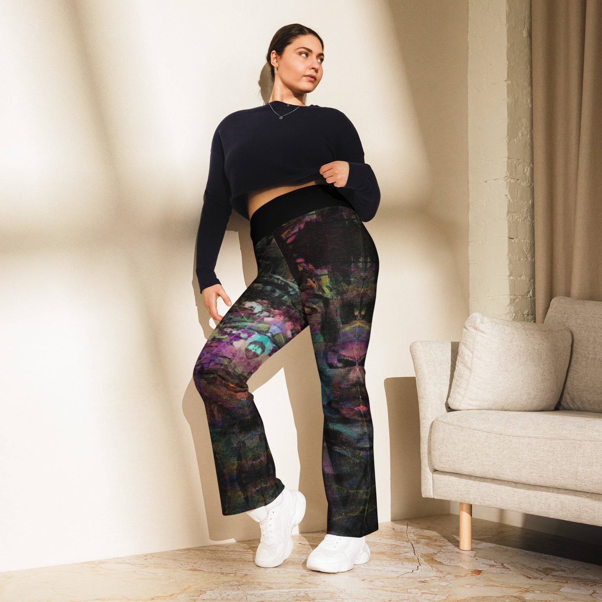 Chromatic Dreams Flare Leggings: high-waisted, vibrant abstract print, recycled fabric. Butt-lifting fit with flared legs and UPF 50+ by Hipyfi. front