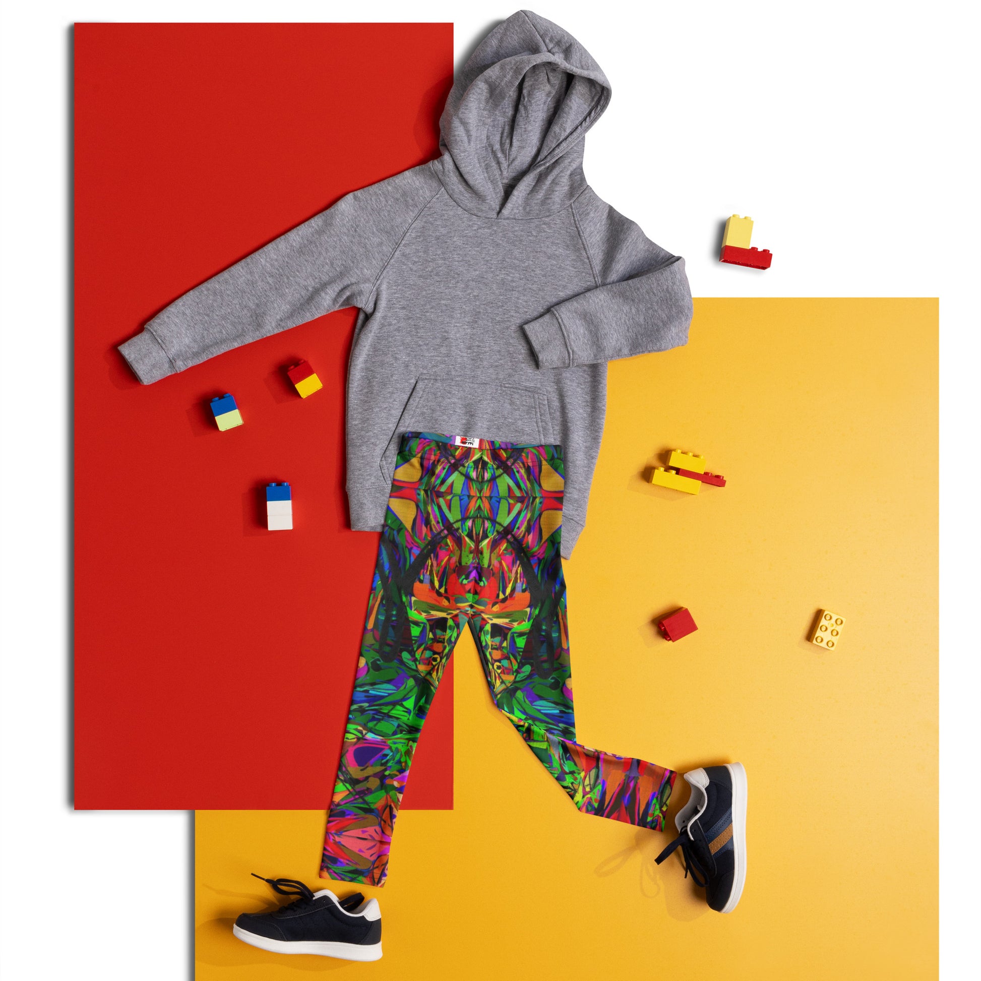 Colorful abstract print kids leggings with neon hues and modern art design, perfect for active children. Front-2