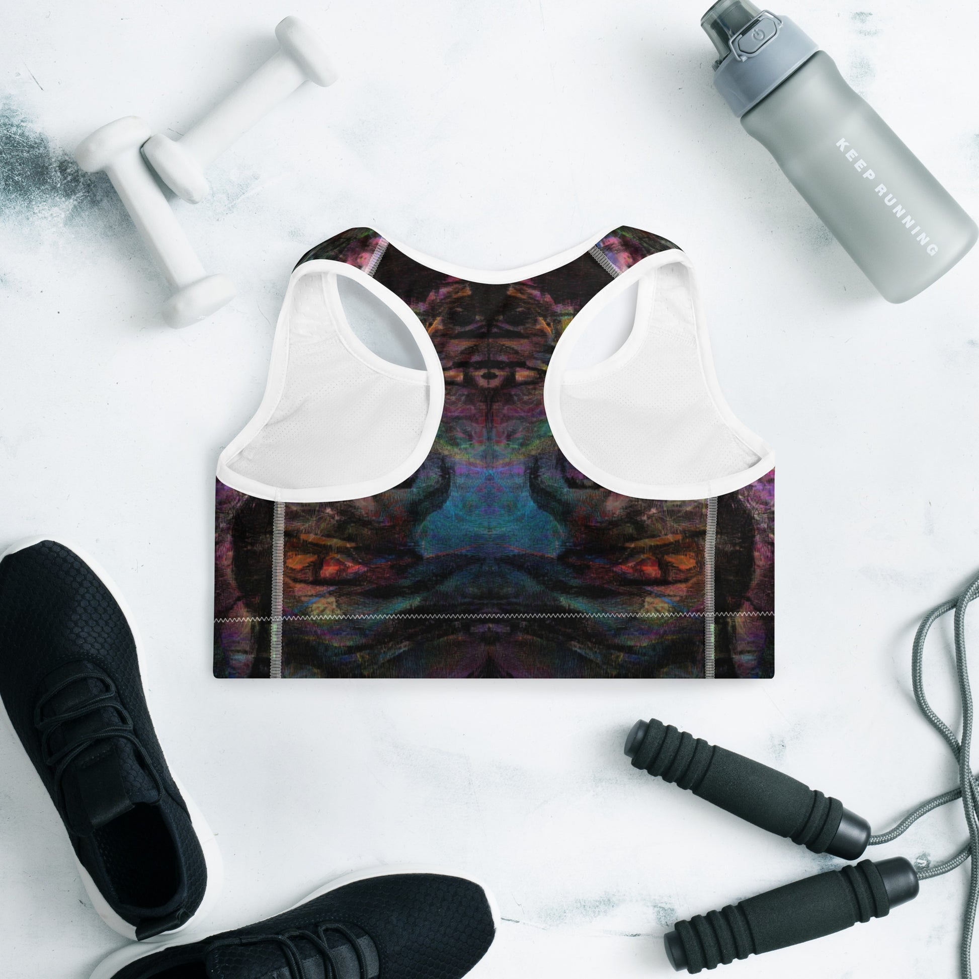 Vibrant abstract-pattern sports bra for women with bold purple, and racerback design. Hipyfi’s Chromatic Dreams high-impact bra, crafted sustainably for A–C cups. back