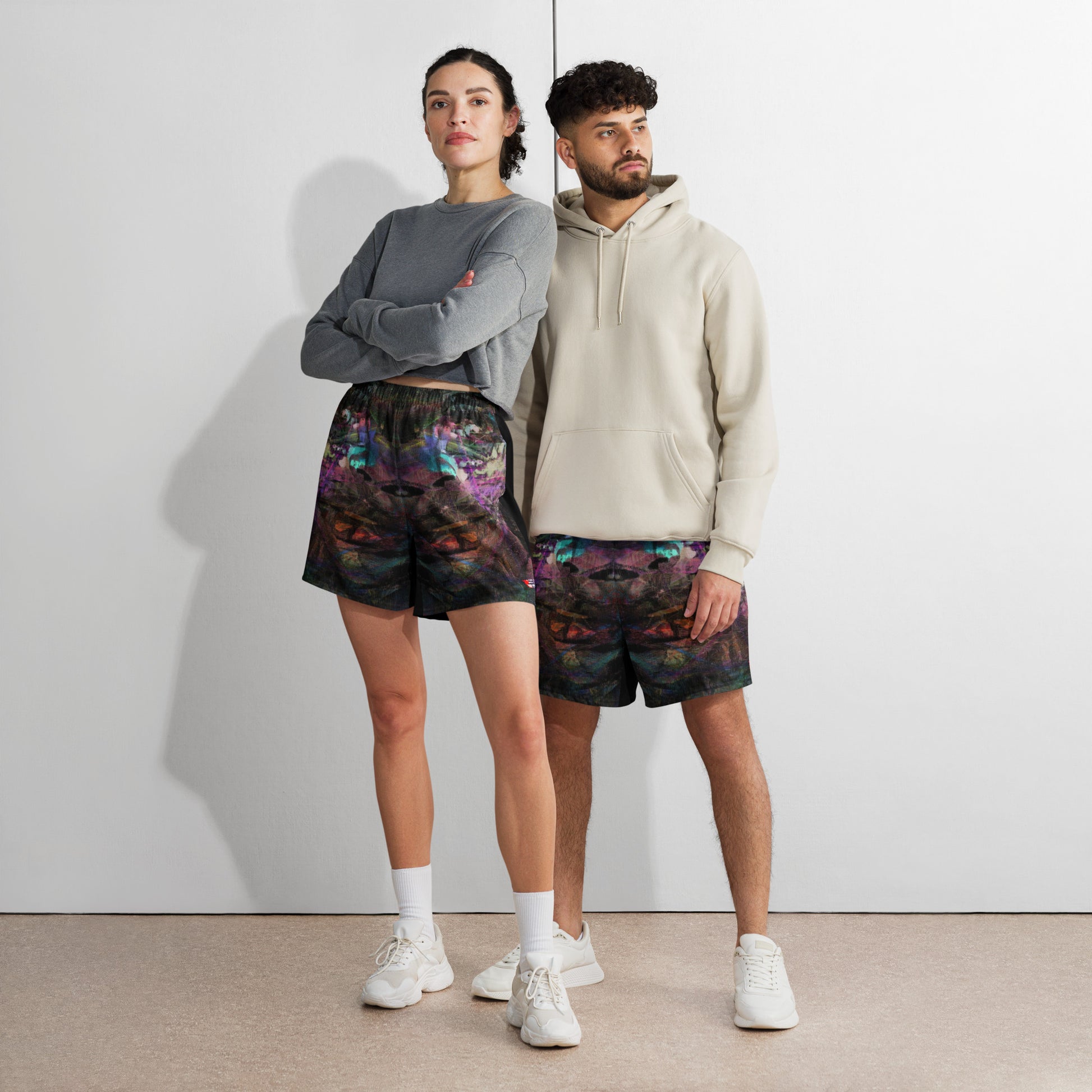 Hipyfi Chromatic Dreams Unisex Long Shorts featuring a vibrant abstract design – eco-friendly and breathable athletic wear. Front