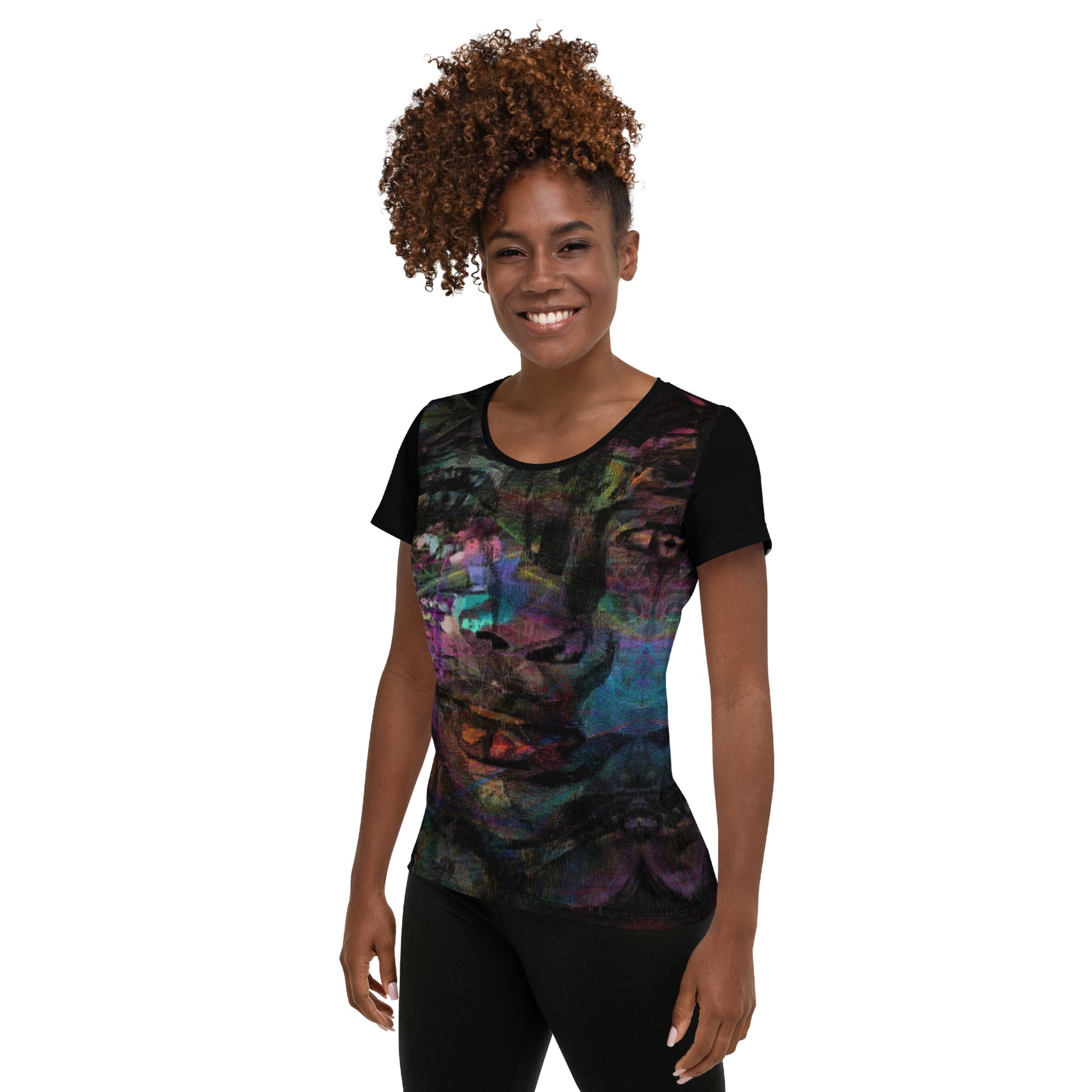 A woman in a vibrant Hipyfi Chromatic Dreams Athletic Tee. The artistic pattern blends, while the lightweight and performance-ready fit. left-2