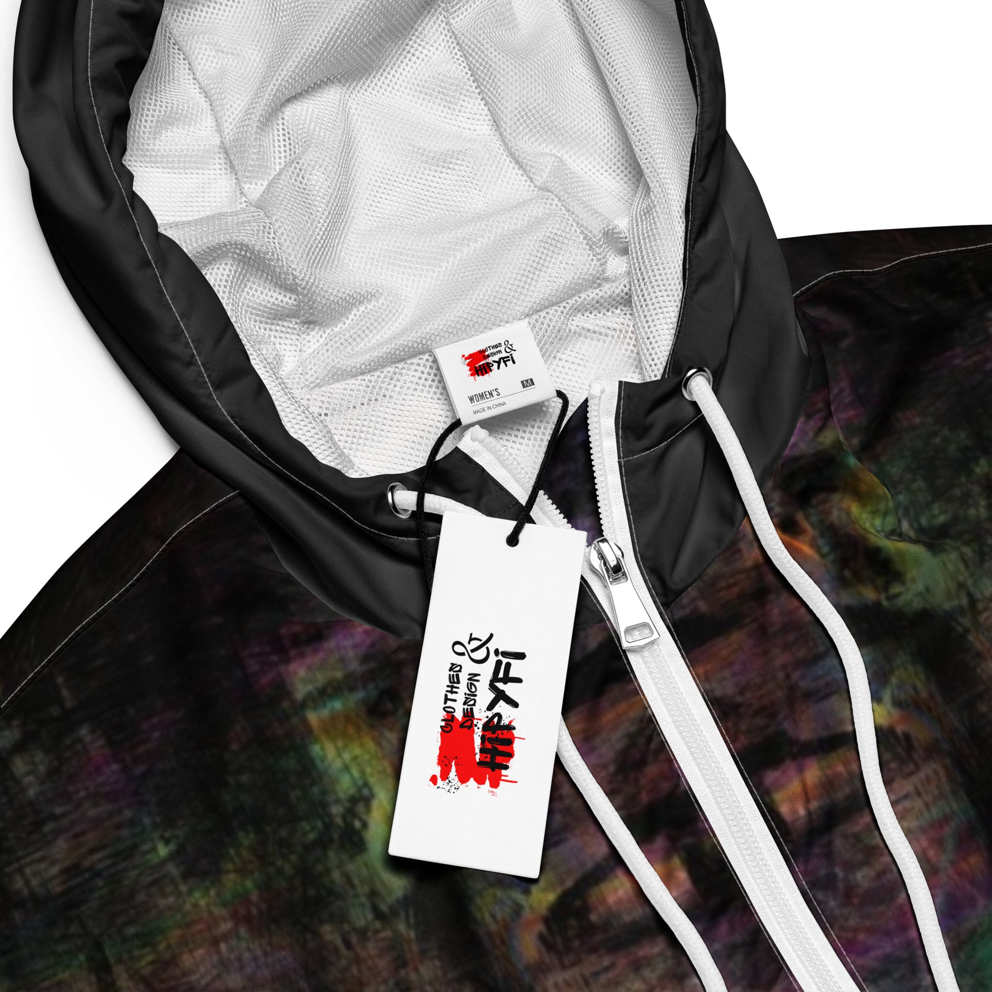 Women's cropped windbreaker by Hipyfi Clothes & Design, featuring a vibrant abstract print. Lightweight, water-resistant jacket, adventure-ready style. product-details