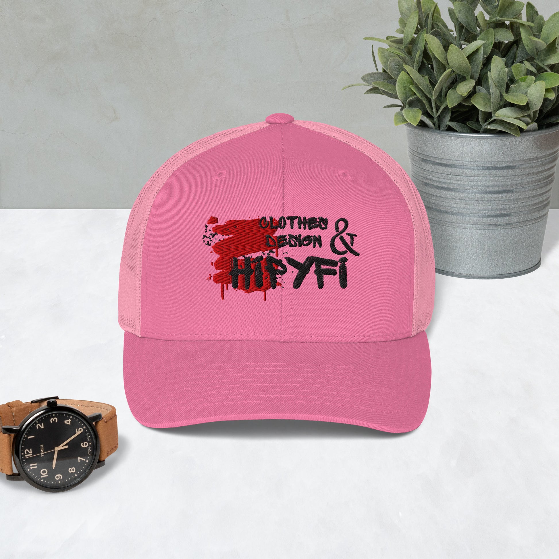 Pink retro trucker hat with mesh back and Hipyfi logo, adjustable snapback cap for men and women. Front-2