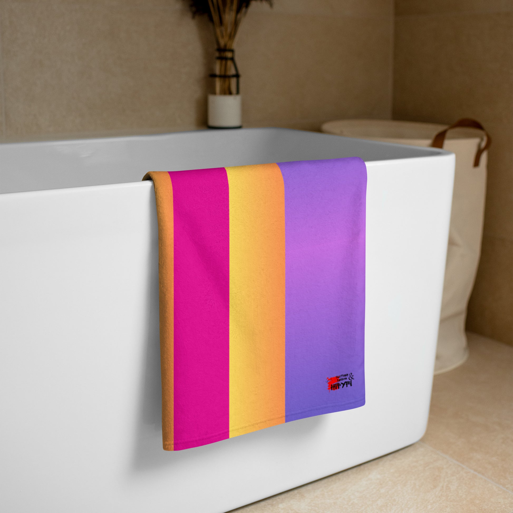Sunset Stripes Towel by Hipyfi, vibrant stripes on a gradient background. Soft blend beach towel. Stylish retro stripe,perfect for bath or beach. lifestyle