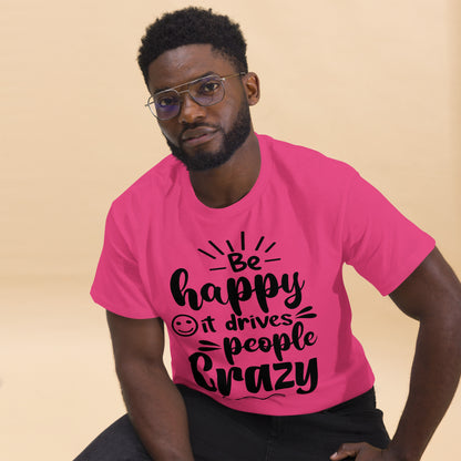 Unisex inspirational t-shirt with “Be Happy, It Drives People Crazy” quote in bold typography – Hipyfi Clothes & Design graphic tee. heliconia-front