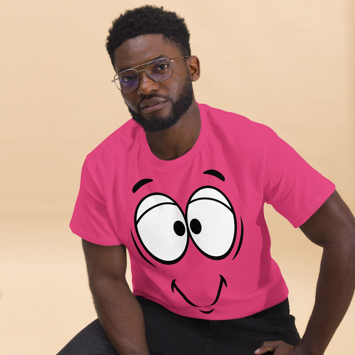 Unisex minimalist cartoon face t-shirt with bold black line art and playful smile – Hipyfi Clothes & Design. heliconia-front-2