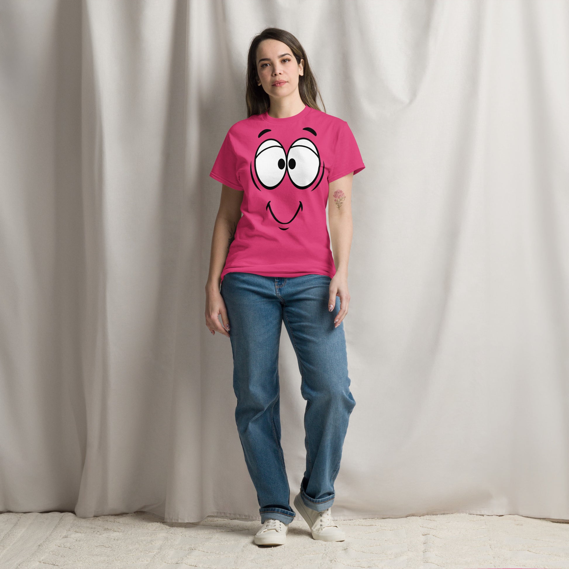 Unisex minimalist cartoon face t-shirt with bold black line art and playful smile – Hipyfi Clothes & Design. heliconia-front-3