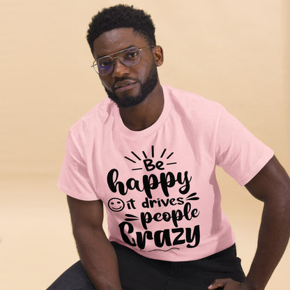 Unisex inspirational t-shirt with “Be Happy, It Drives People Crazy” quote in bold typography – Hipyfi Clothes & Design graphic tee. light-pink-front