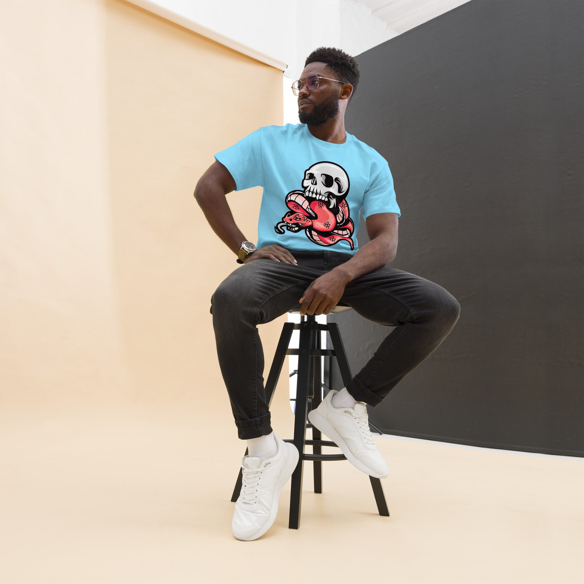 Hipyfi Bold Skull & Snake Unisex T-shirt with tattoo-inspired skull and serpent graphic, perfect for streetwear and punk rock style. sky-front