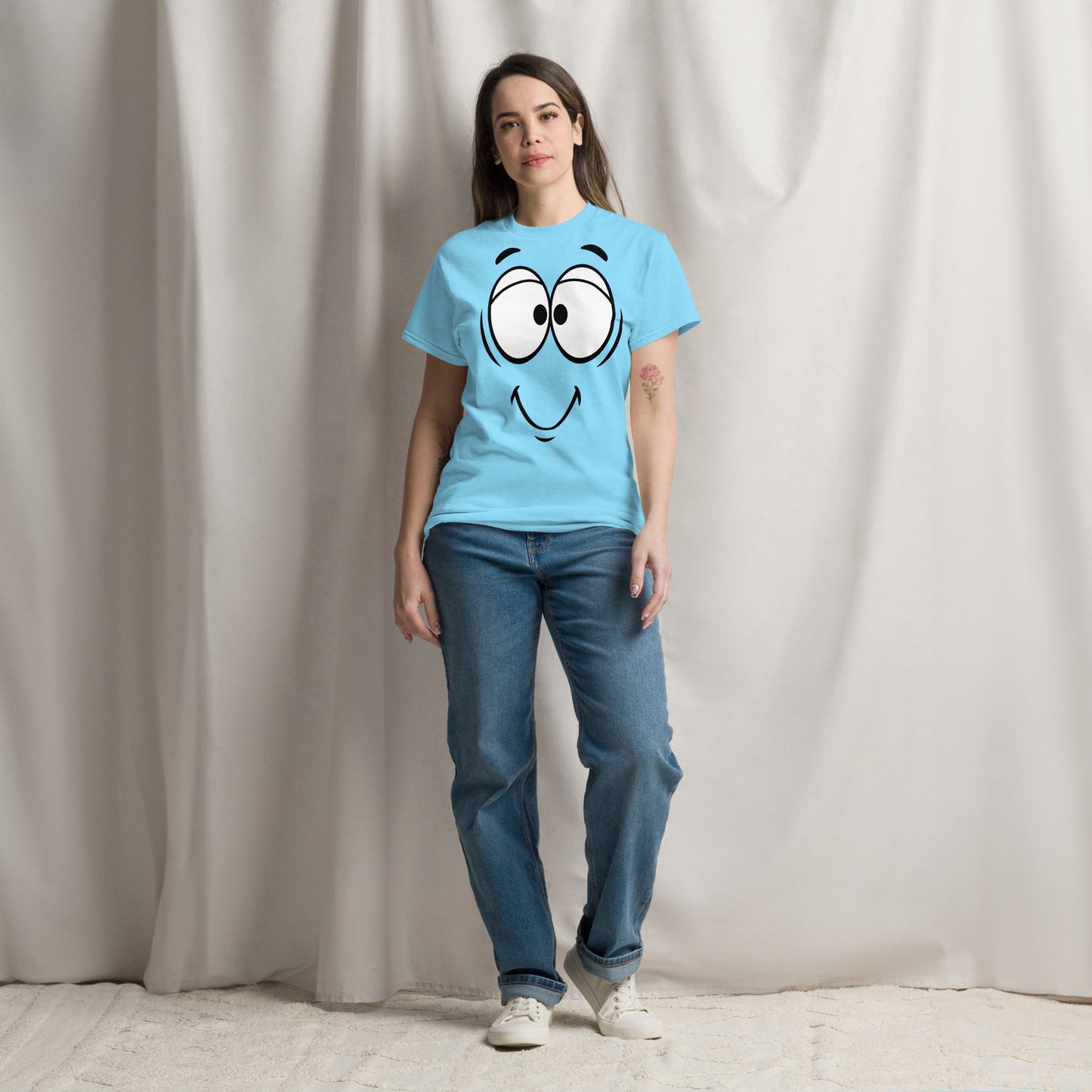 Unisex minimalist cartoon face t-shirt with bold black line art and playful smile – Hipyfi Clothes & Design. sky-front-3