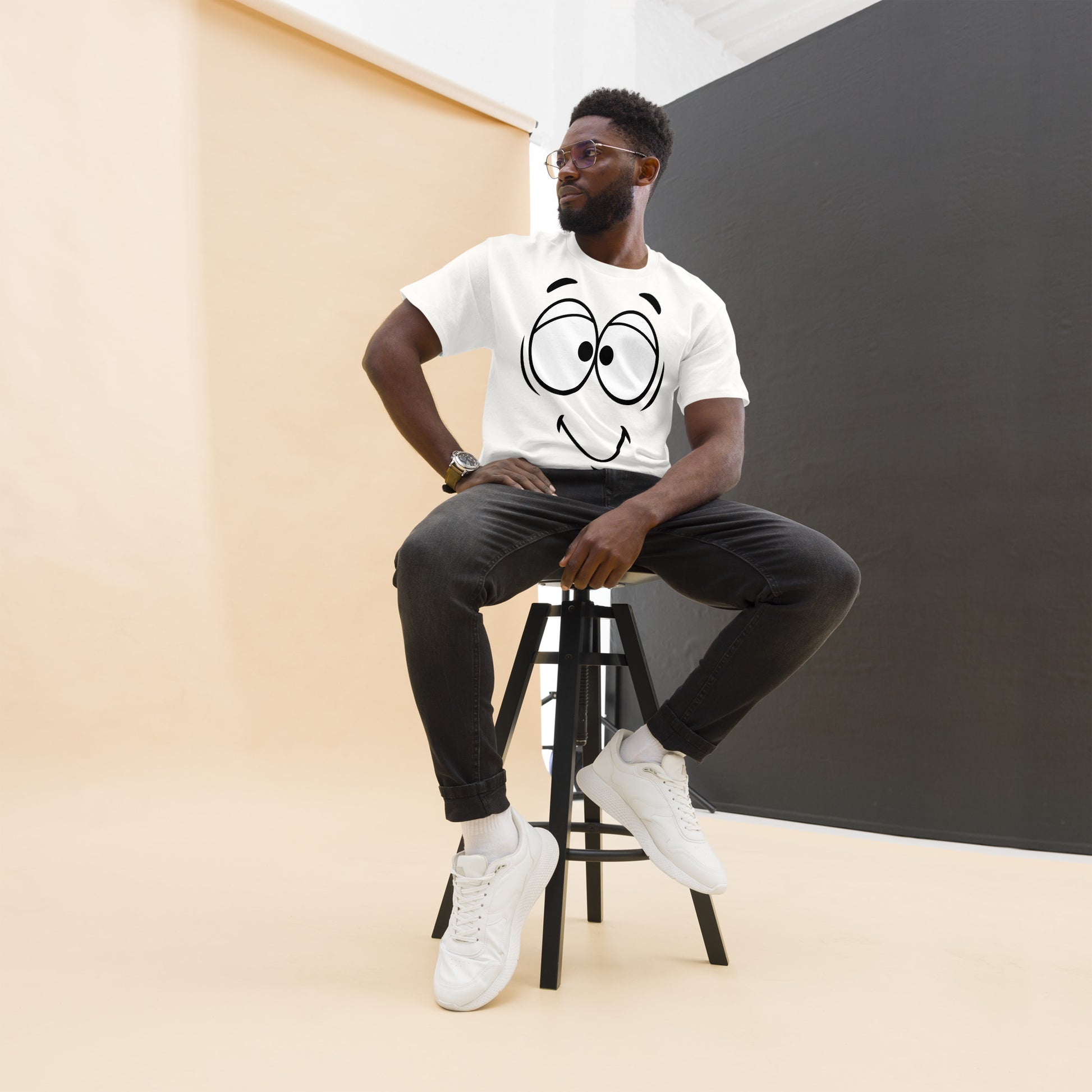 Unisex minimalist cartoon face t-shirt with bold black line art and playful smile – Hipyfi Clothes & Design. white-front