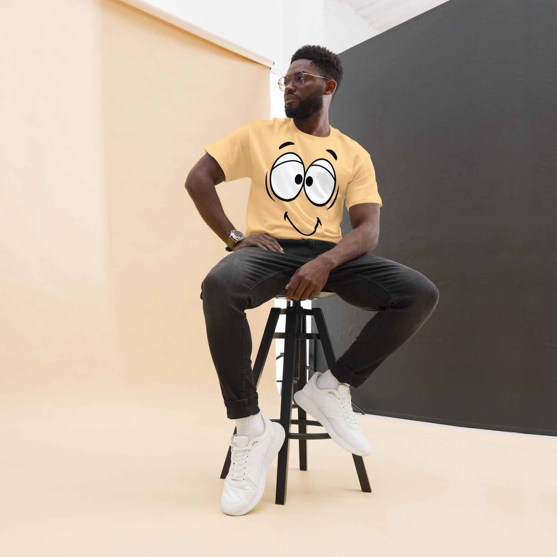Unisex minimalist cartoon face t-shirt with bold black line art and playful smile – Hipyfi Clothes & Design. yellow-haze-front