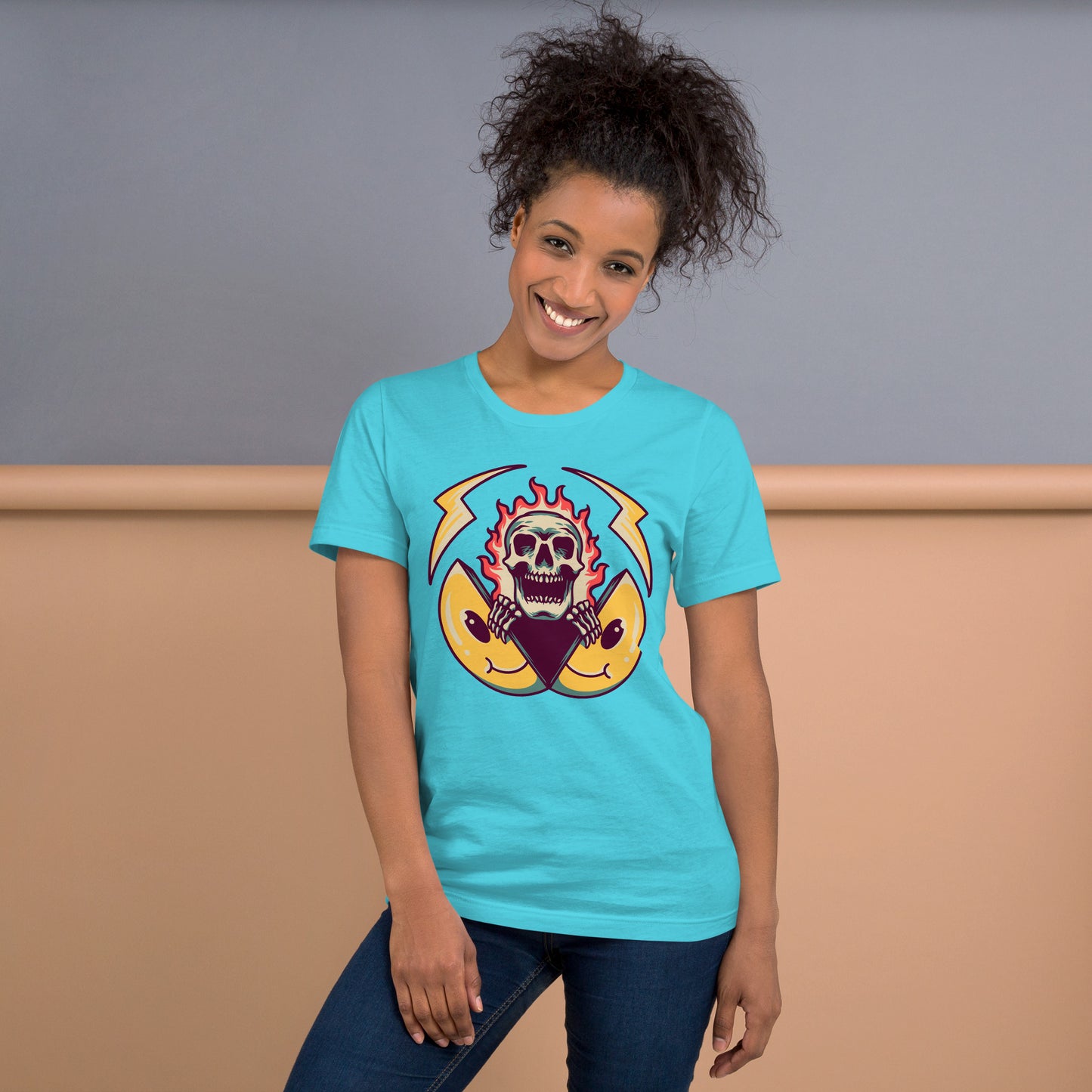 Hipyfi unisex graphic t-shirt featuring flame skull and surreal smiley design in streetwear style. turquoise-front
