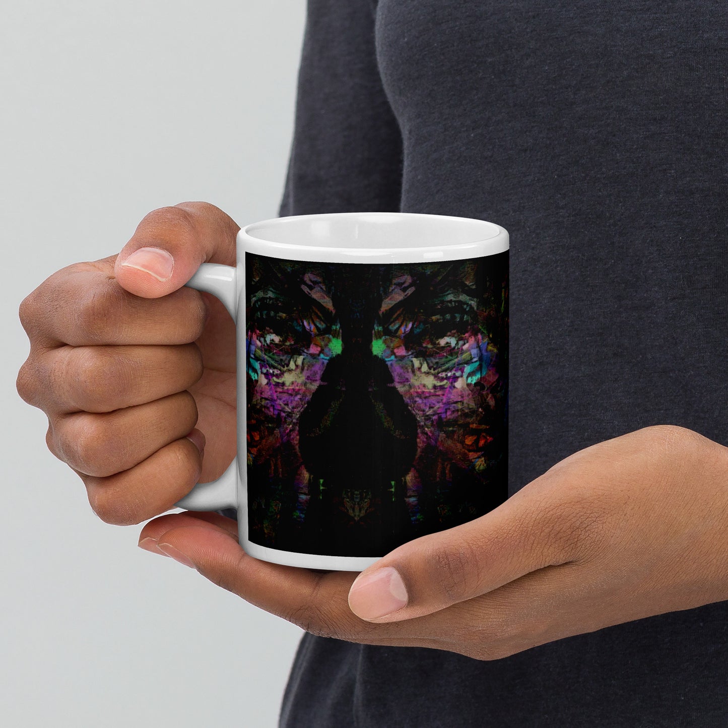 Hipyfi Chromatic Dreams Ceramic Mug with abstract vibrant design on a glossy white surface. Held in hand, unisex, dishwasher-safe. 11-oz-5