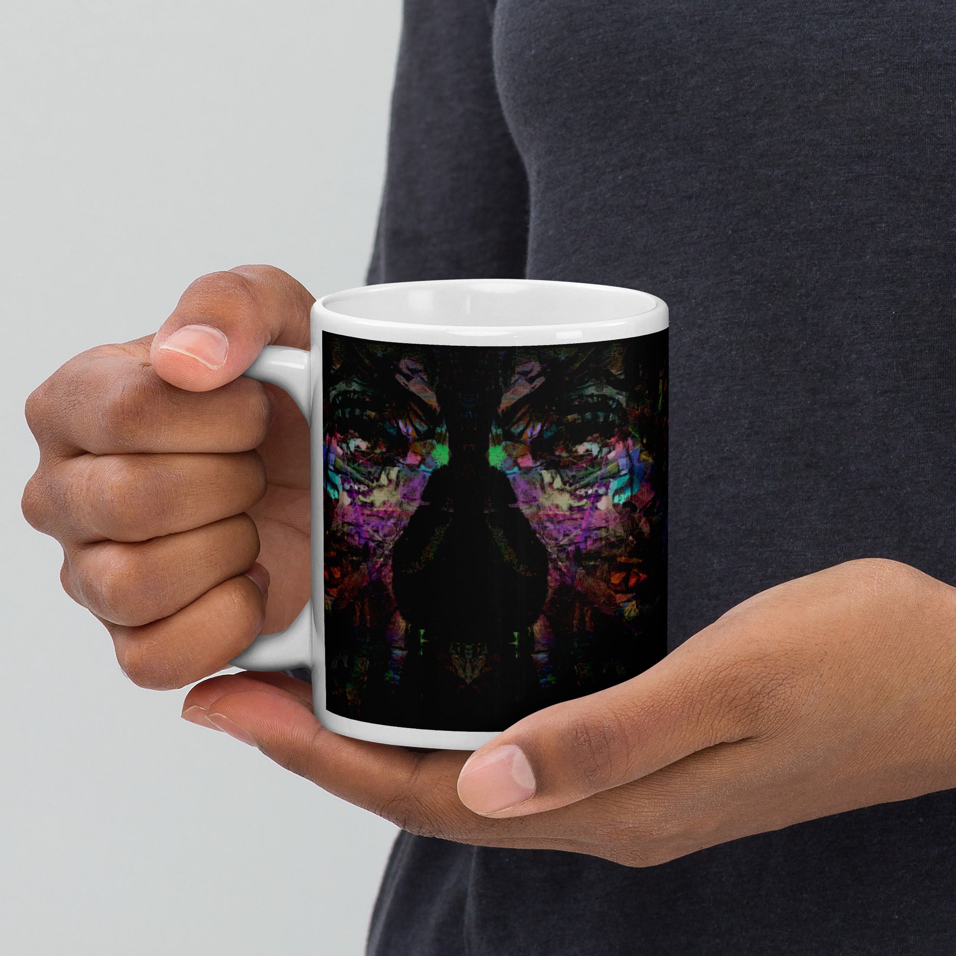Hipyfi Chromatic Dreams Ceramic Mug with abstract vibrant design on a glossy white surface. Held in hand, unisex, dishwasher-safe. 11-oz-5
