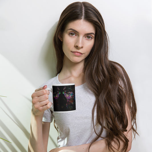 Hipyfi Chromatic Dreams Ceramic Mug with abstract vibrant design on a glossy white surface. Held in hand, unisex, dishwasher-safe. 11-oz