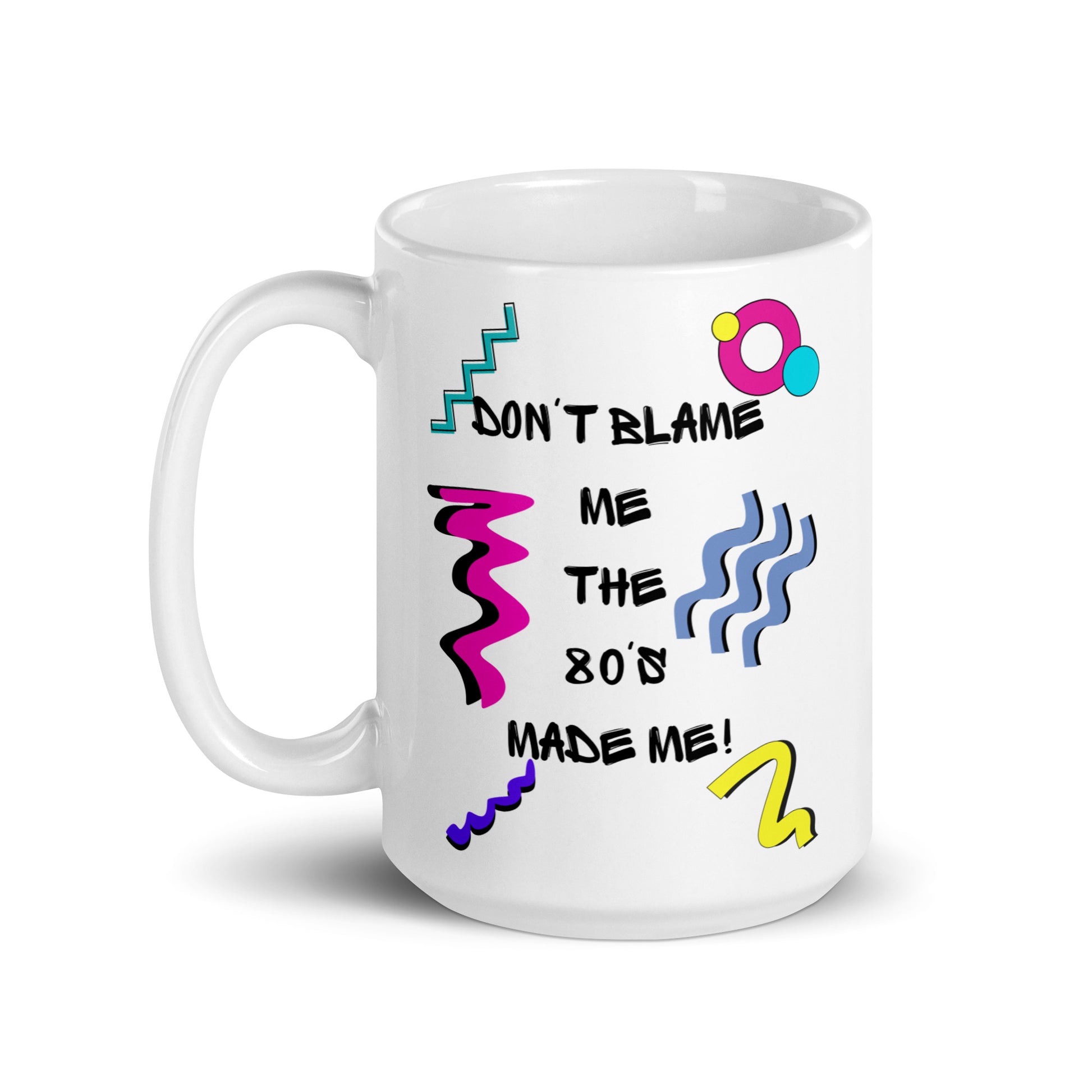 Retro 80s ceramic mug with colorful abstract design and ‘Don’t Blame Me, The 80s Made Me!’ quote by Hipyfi Clothes & Design 15-oz-handle-on-left