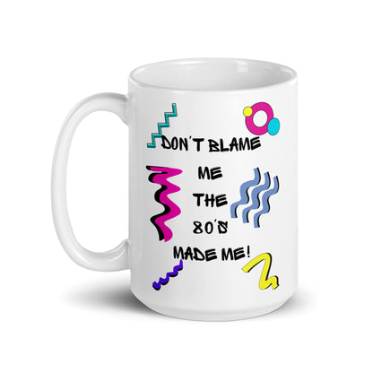 Retro 80s ceramic mug with colorful abstract design and ‘Don’t Blame Me, The 80s Made Me!’ quote by Hipyfi Clothes & Design 15-oz-handle-on-left