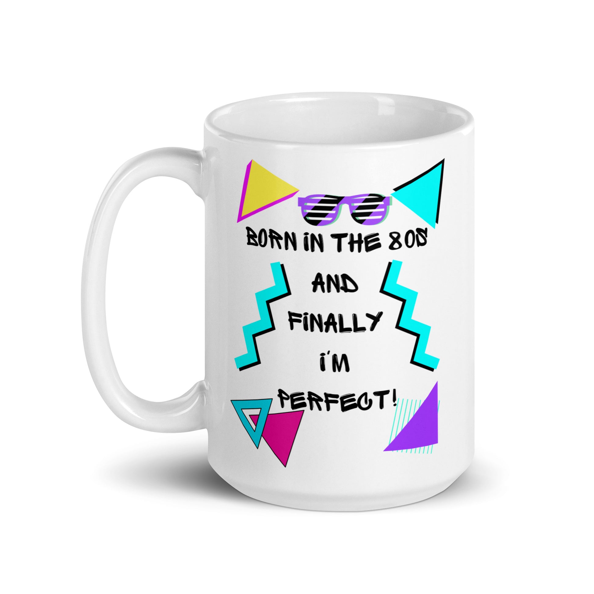 Retro 80s ceramic coffee mug with bold geometric design and 'Born in the 80s and finally I'm perfect!' text – by Hipyfi Clothes & Design 15-oz-handle-on-left