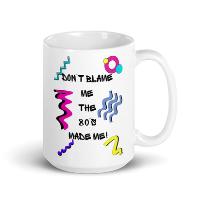 Retro 80s ceramic mug with colorful abstract design and ‘Don’t Blame Me, The 80s Made Me!’ quote by Hipyfi Clothes & Design 15-oz-handle-on-right