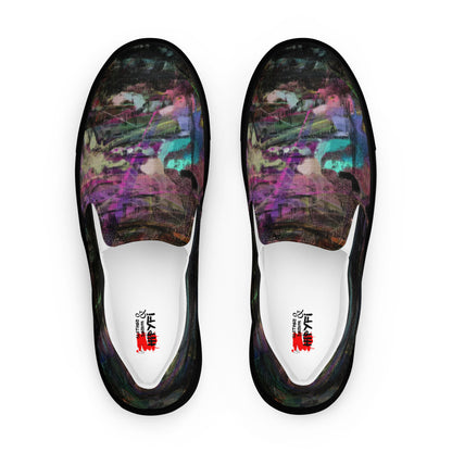 Close-up of Hipyfi Women’s Chromatic Dreams slip-on sneakers, showcasing a modern abstract face design with multicolor, elastic side accents, and a cushioned sole for comfort. black-front-4
