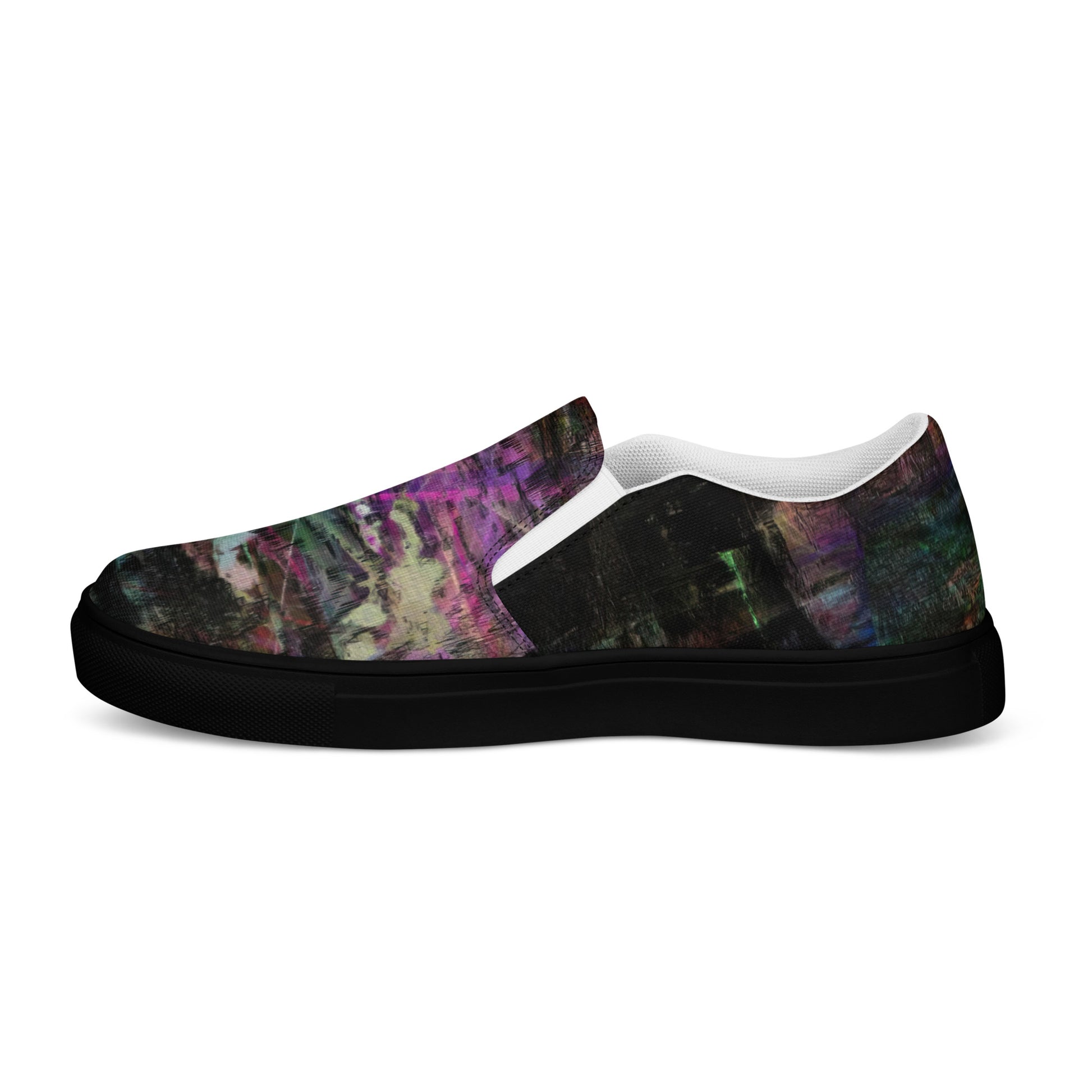 Close-up of Hipyfi Women’s Chromatic Dreams slip-on sneakers, showcasing a modern abstract face design with multicolor, elastic side accents, and a cushioned sole for comfort. black-left-outside