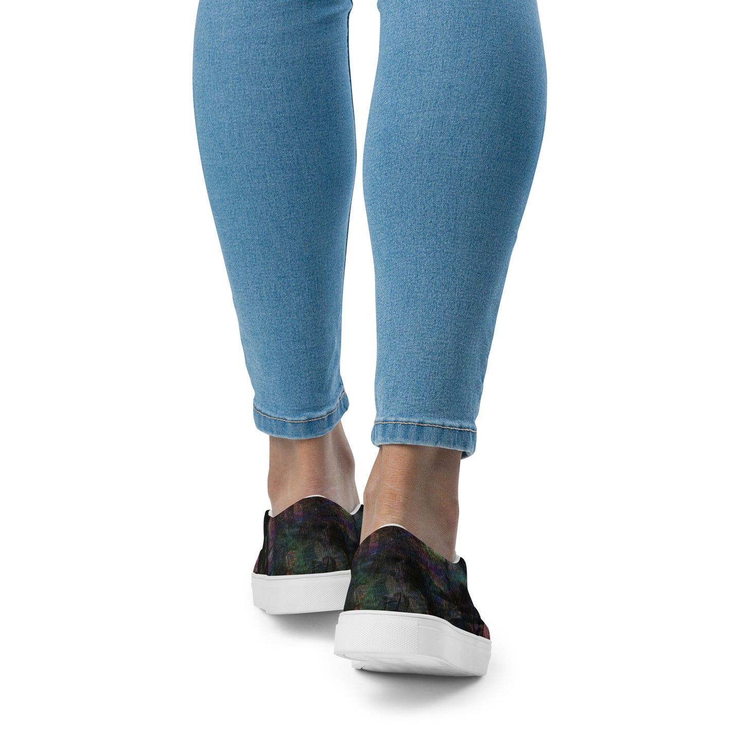 Close-up of Hipyfi Women’s Chromatic Dreams slip-on sneakers, showcasing a modern abstract face design with multicolor, elastic side accents, and a cushioned sole for comfort. white-back