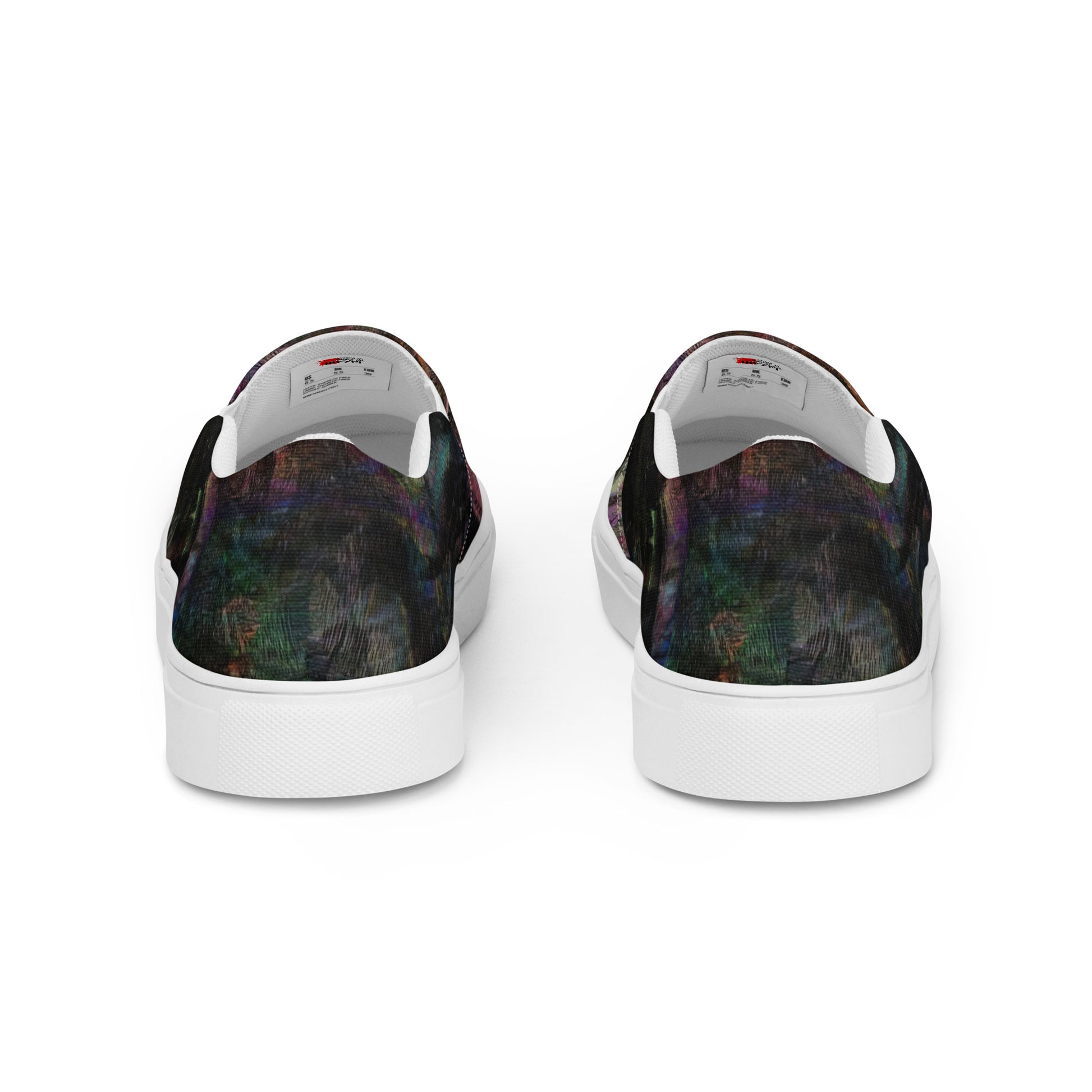 Close-up of Hipyfi Women’s Chromatic Dreams slip-on sneakers, showcasing a modern abstract face design with multicolor, elastic side accents, and a cushioned sole for comfort. white-back-4