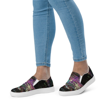 Close-up of Hipyfi Women’s Chromatic Dreams slip-on sneakers, showcasing a modern abstract face design with multicolor, elastic side accents, and a cushioned sole for comfort. white-front-3