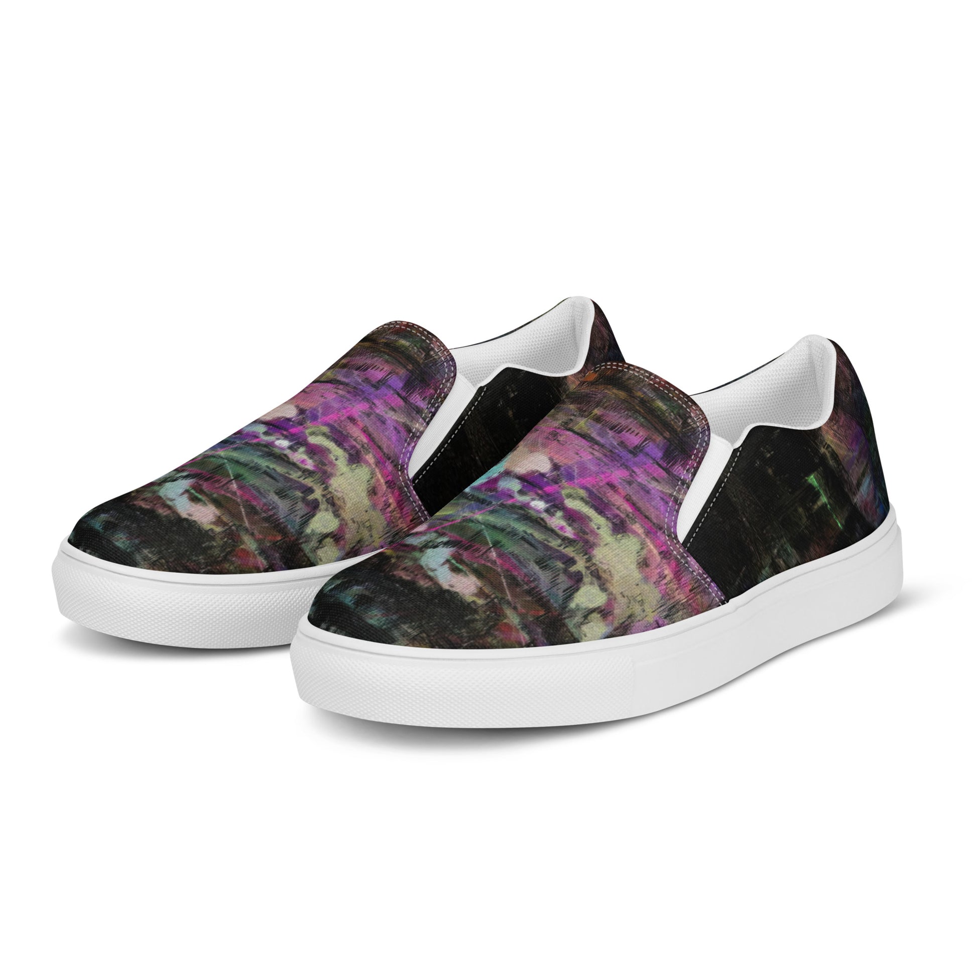 Close-up of Hipyfi Women’s Chromatic Dreams slip-on sneakers, showcasing a modern abstract face design with multicolor, elastic side accents, and a cushioned sole for comfort. white-left-front